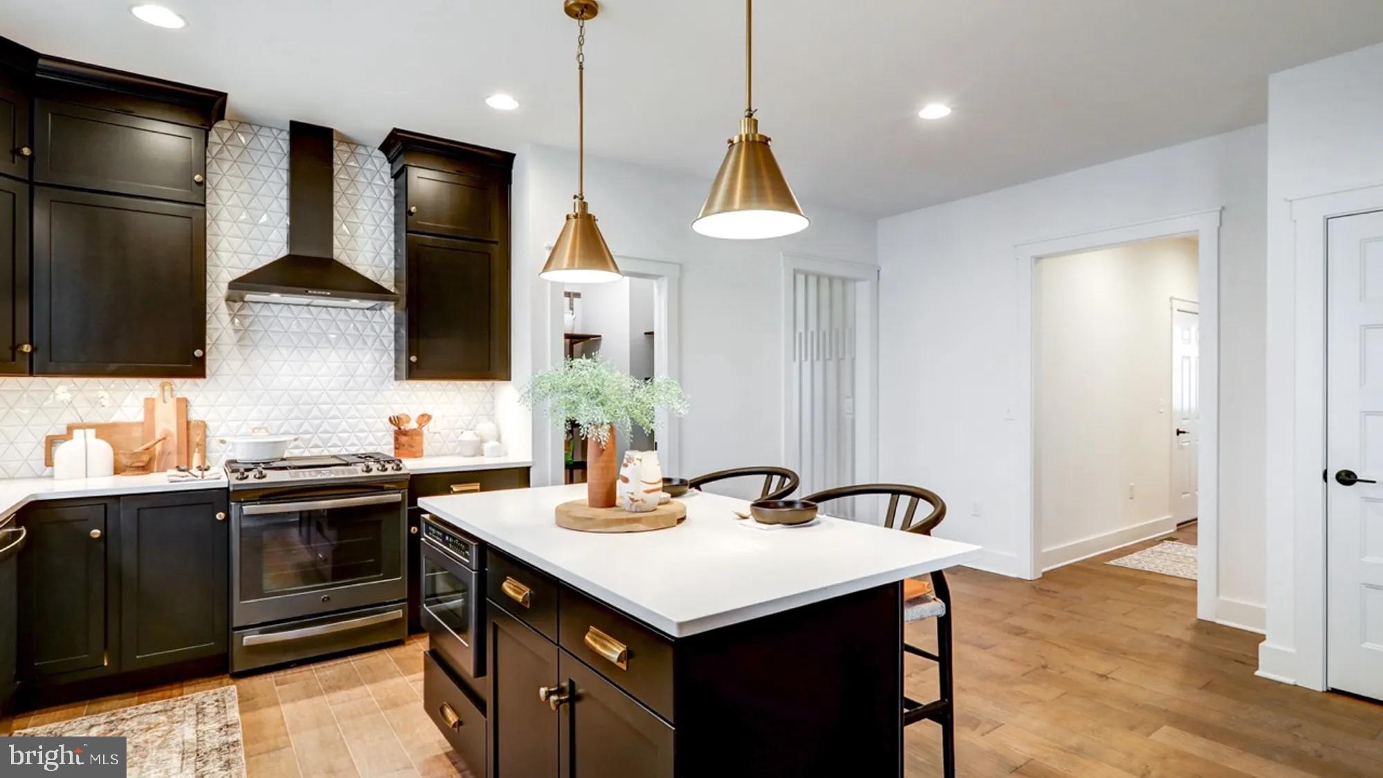 108 Flora Boulevard Lebanon, PA 17042 - Photo 6 of 44 a kitchen with a sink a counter space appliances and cabinets