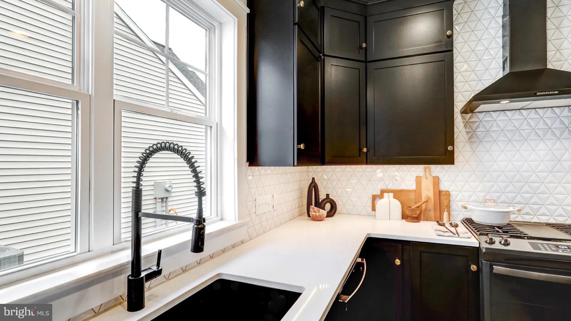 108 Flora Boulevard Lebanon, PA 17042 - Photo 10 of 44 a kitchen with a sink and a refrigerator