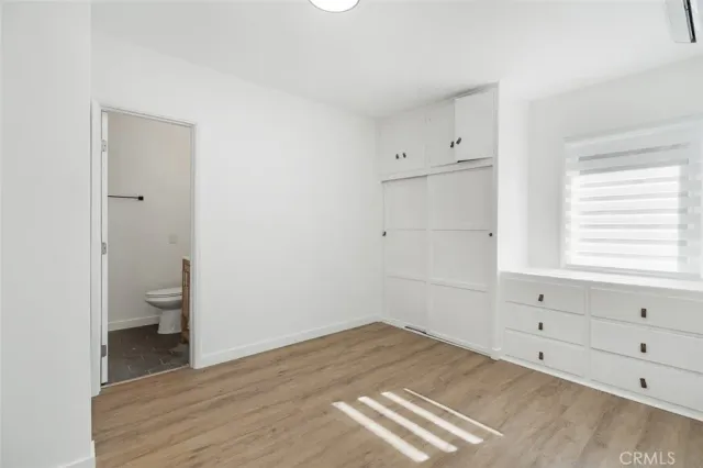 a view of a bathroom with a toilet