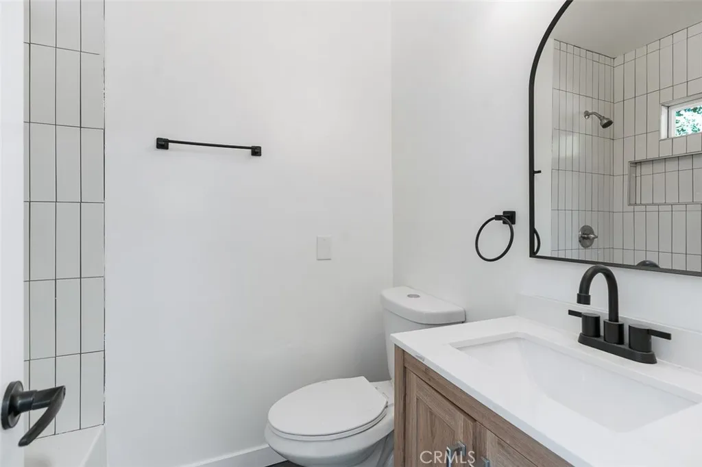 411 North Euclid Avenue Pasadena, CA 91101 - Photo 28 of 40 a bathroom with a sink a toilet and shower