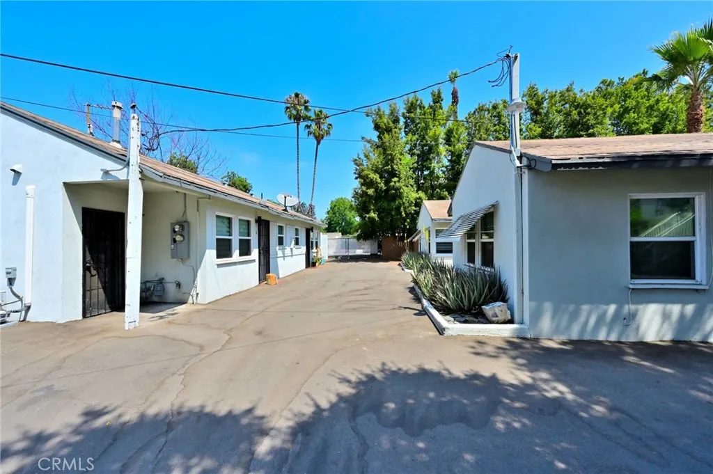 411 North Euclid Avenue Pasadena, CA 91101 - Photo 35 of 40 a view of a house with porch and potted plants
