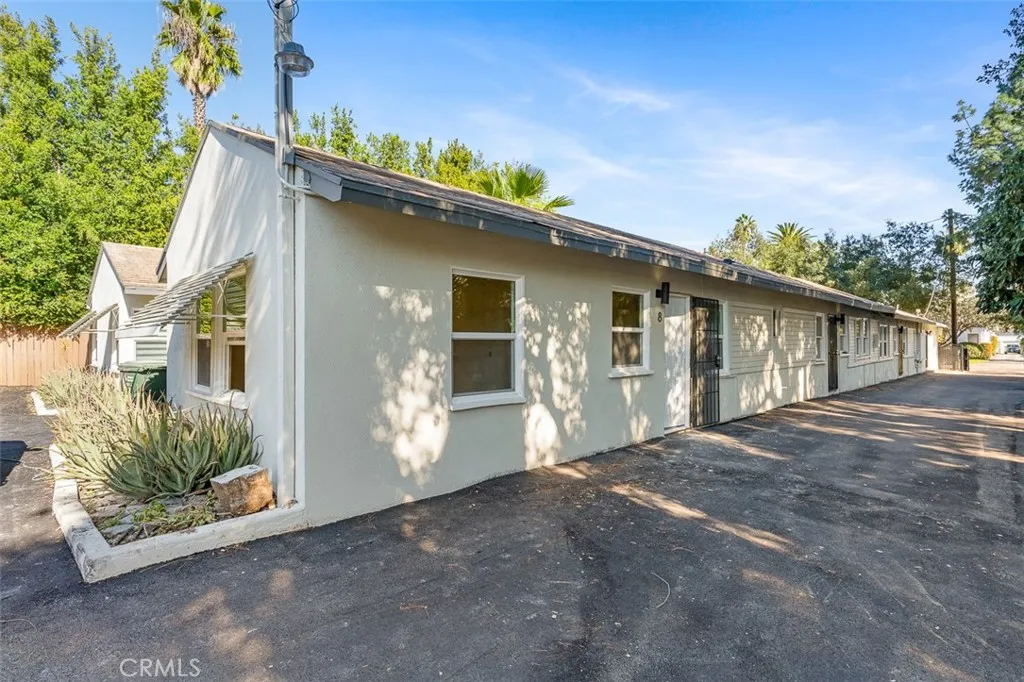 411 North Euclid Avenue Pasadena, CA 91101 - Photo 5 of 40 a front view of a house with a porch