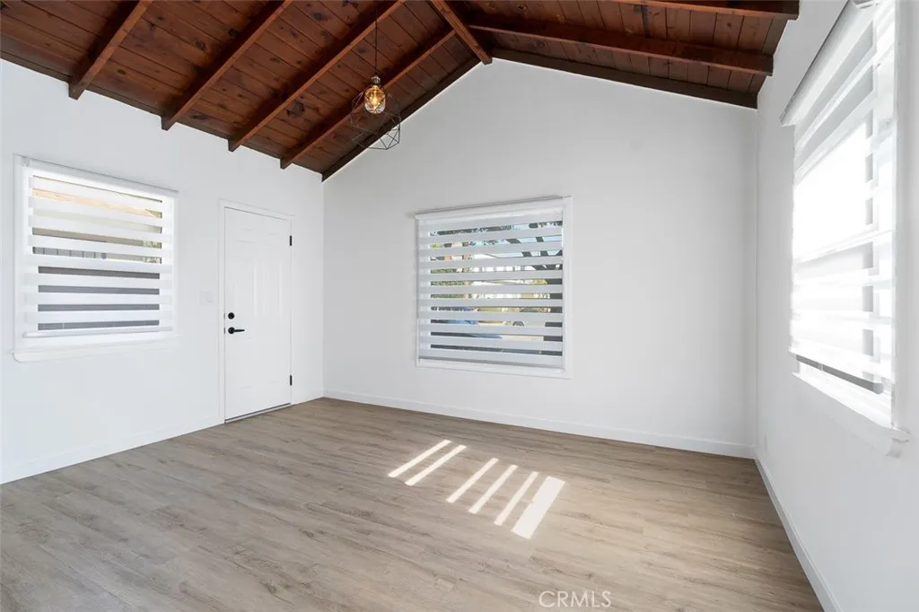 411 North Euclid Avenue Pasadena, CA 91101 - Photo 7 of 40 a view of empty room with wooden floor and fan