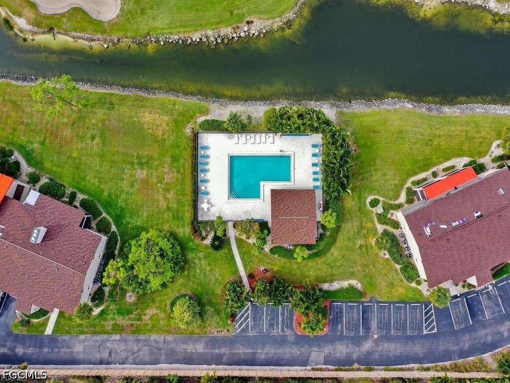 16560 Partridge Place Road, Unit 101 Fort Myers, FL 33908 - Photo 19 of 27 an aerial view of house with yard swimming pool and outdoor seating