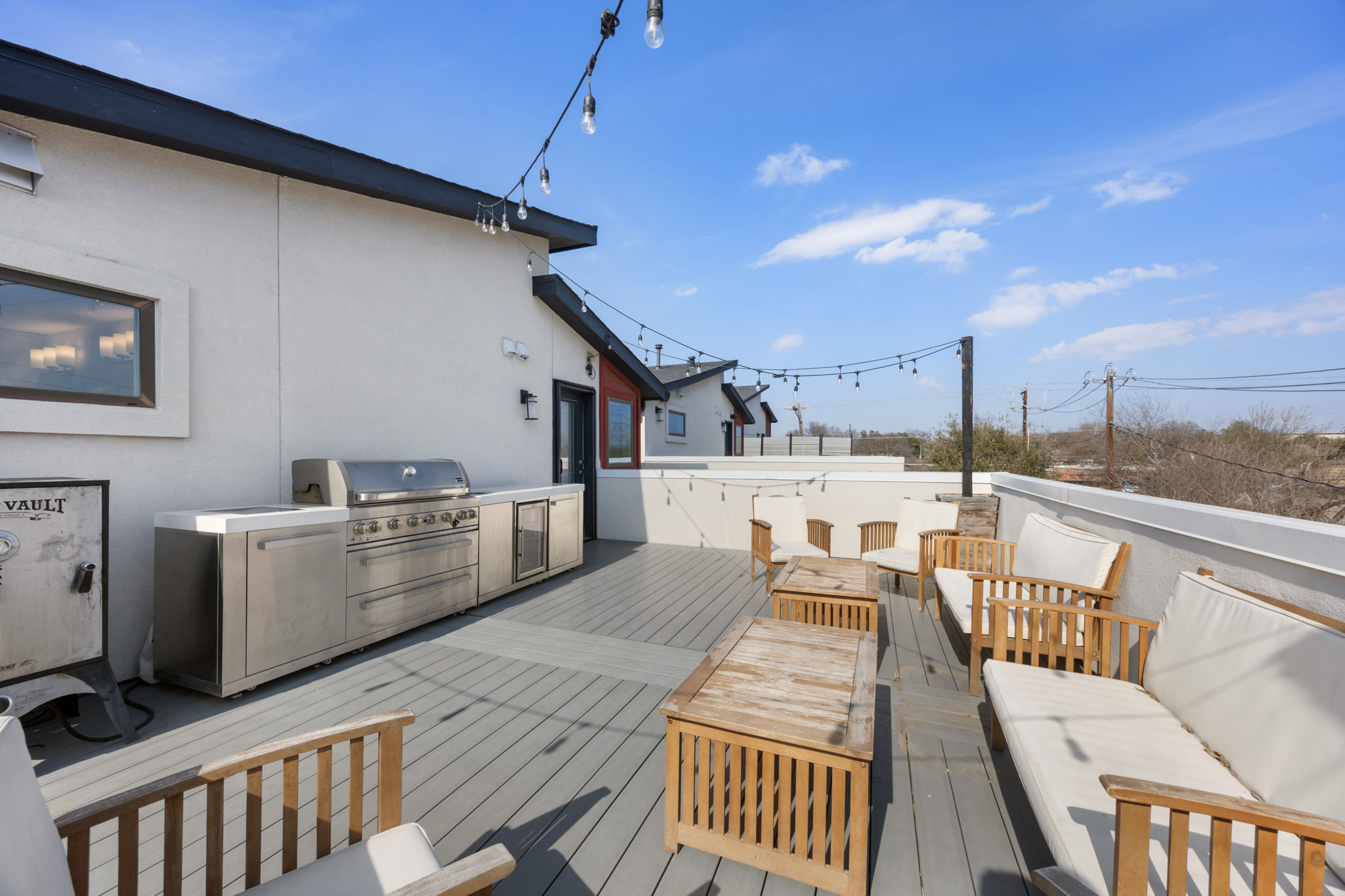 1417 Kramer Lane, Unit 14 Austin, TX 78758 - Photo 24 of 33 Deck with an outdoor kitchen with living area