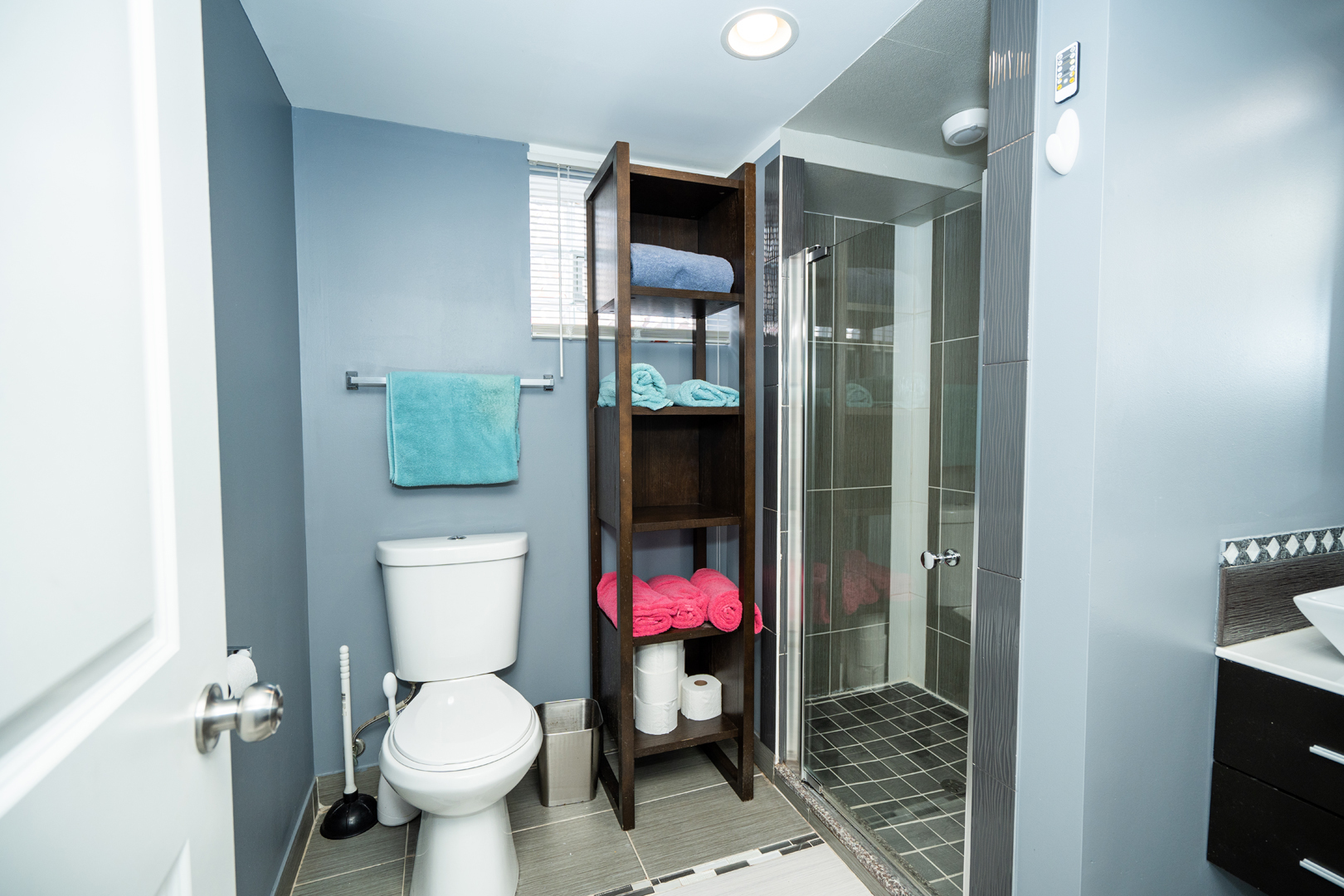 4114 West 79th Place Chicago, IL 60652 - Photo 19 of 30 a bathroom with a sink toilet and shower