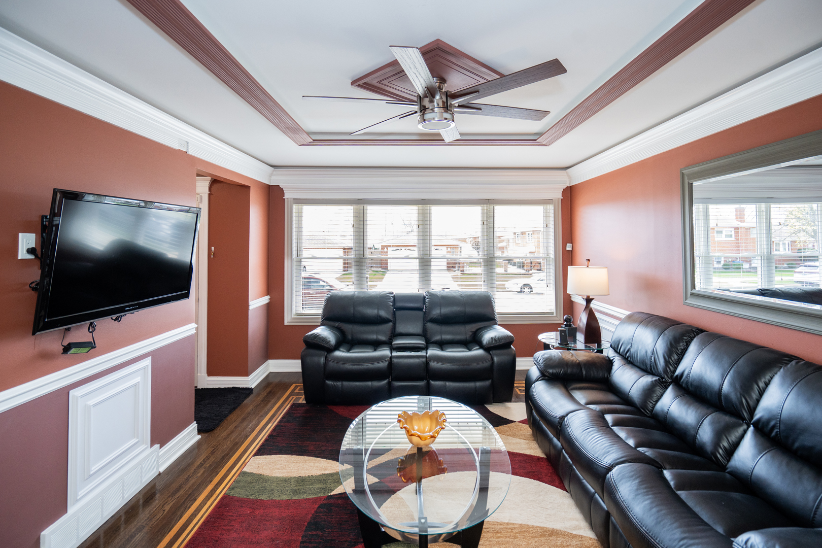 4114 West 79th Place Chicago, IL 60652 - Photo 4 of 30 a living room with furniture and a flat screen tv