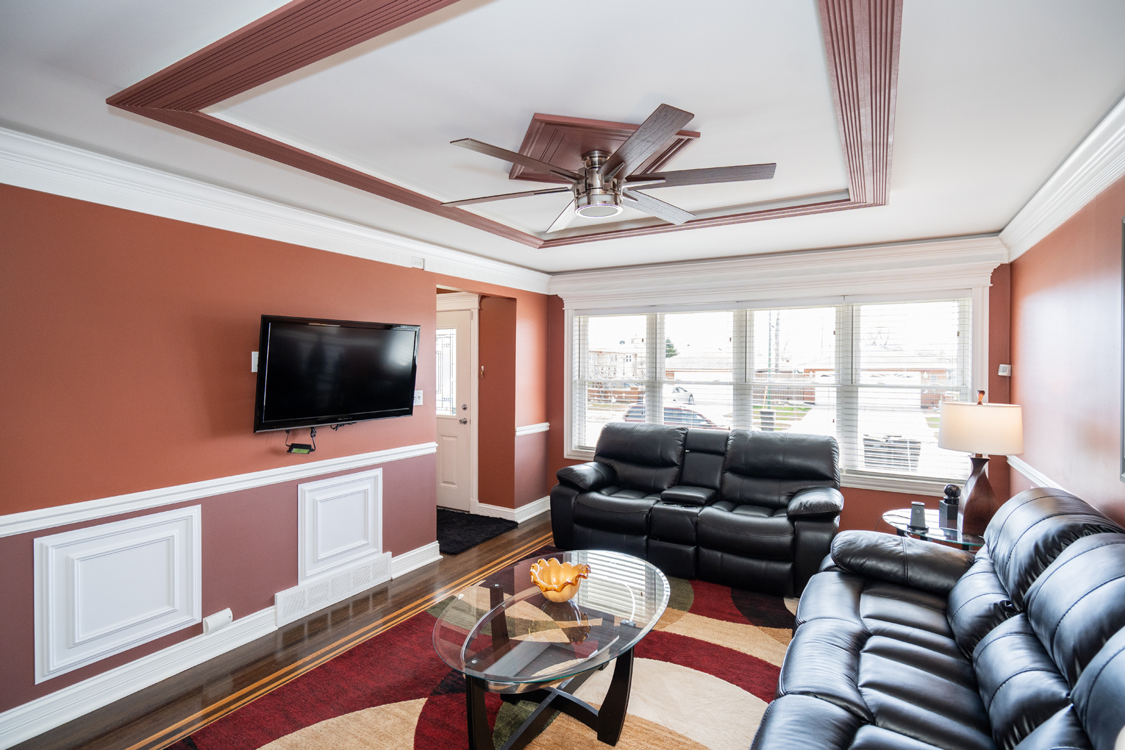 4114 West 79th Place Chicago, IL 60652 - Photo 5 of 30 a living room with furniture and a flat screen tv