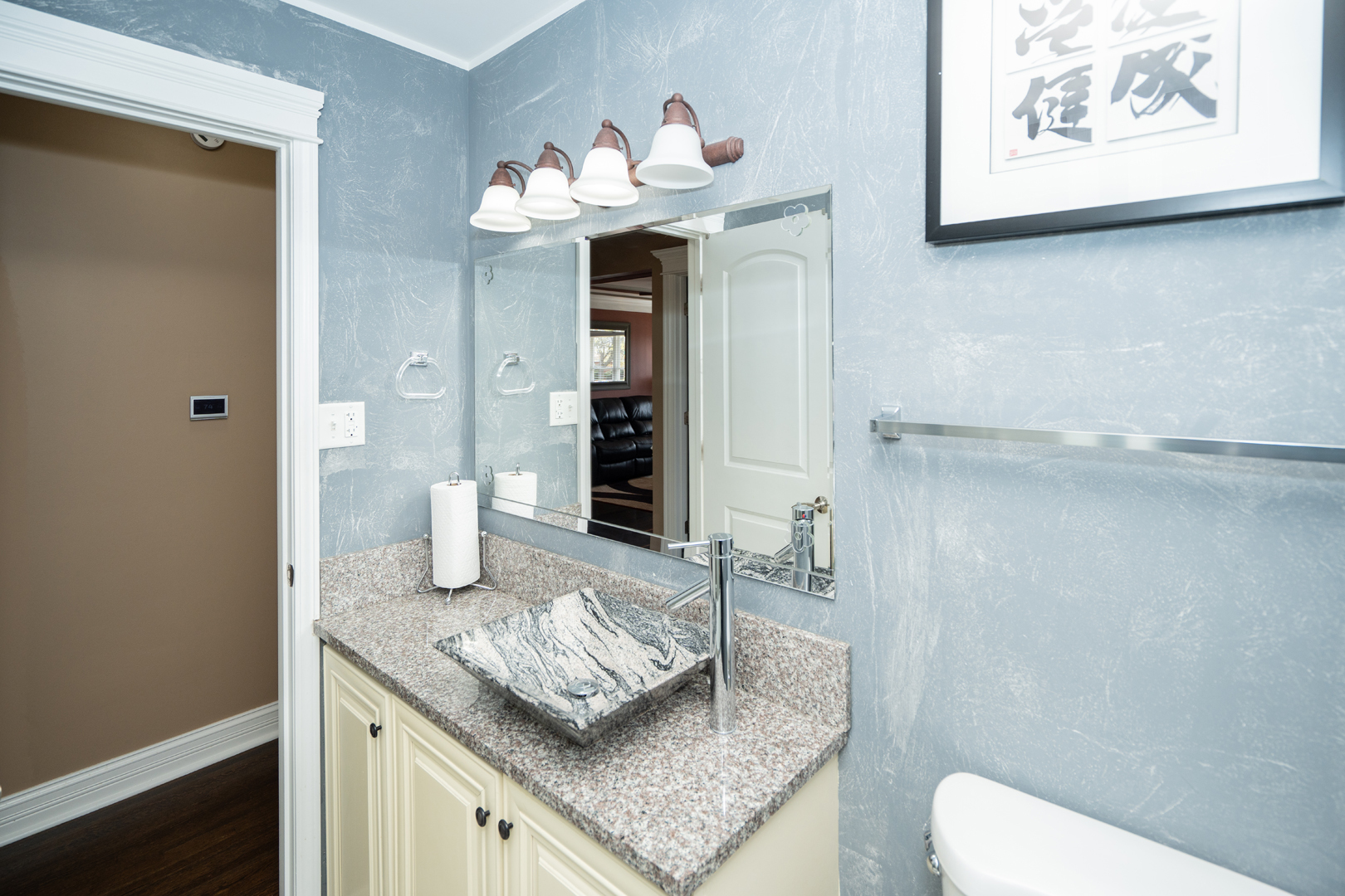 4114 West 79th Place Chicago, IL 60652 - Photo 9 of 30 a living room with furniture and a chandelier