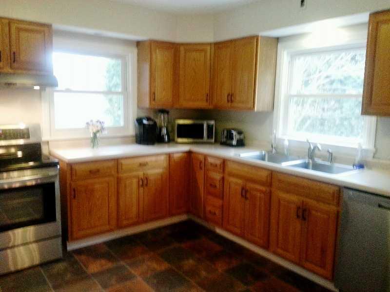 9406 Woodcrest Road Pittsburgh, PA 15237 - Photo 13 of 25 Kitchen. 13 x 11 New flooring, new five burner stainless GE stove, added a dishwasher, GE LG stainless