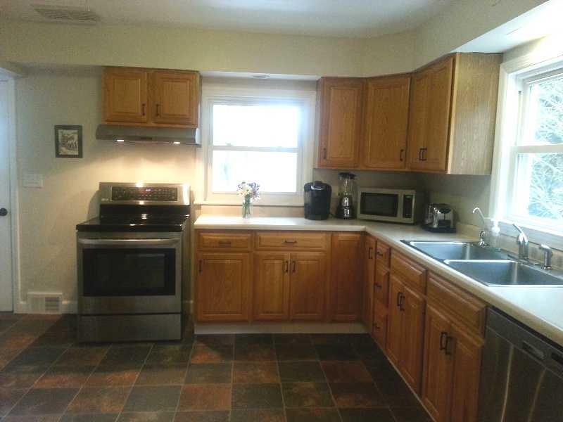 9406 Woodcrest Road Pittsburgh, PA 15237 - Photo 15 of 25 Kitchen. Room for table, if desired. Exit to rear deck