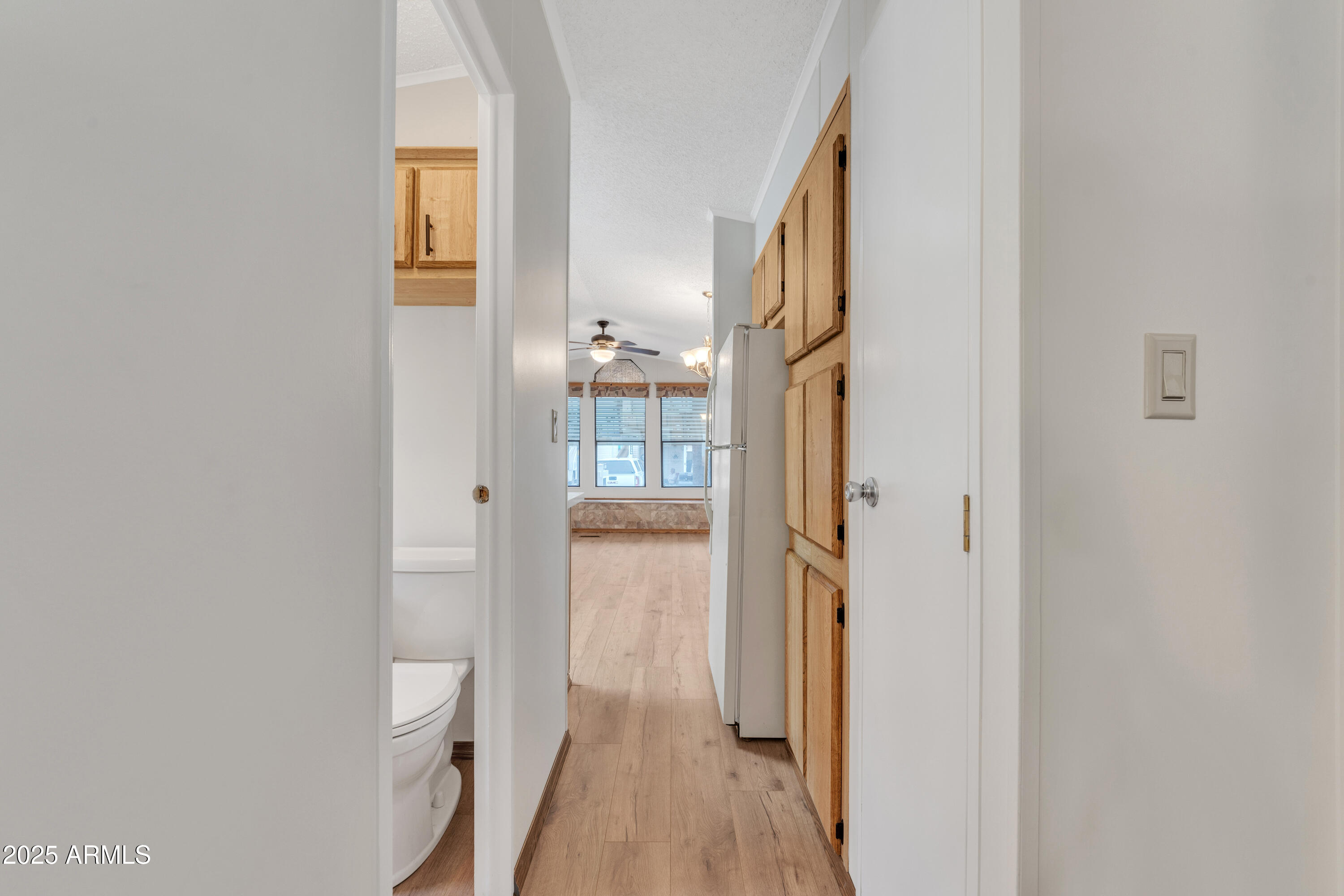 1152 South Sioux Drive Apache Junction, AZ 85119 - Photo 31 of 50 a view of a bathroom from a hallway
