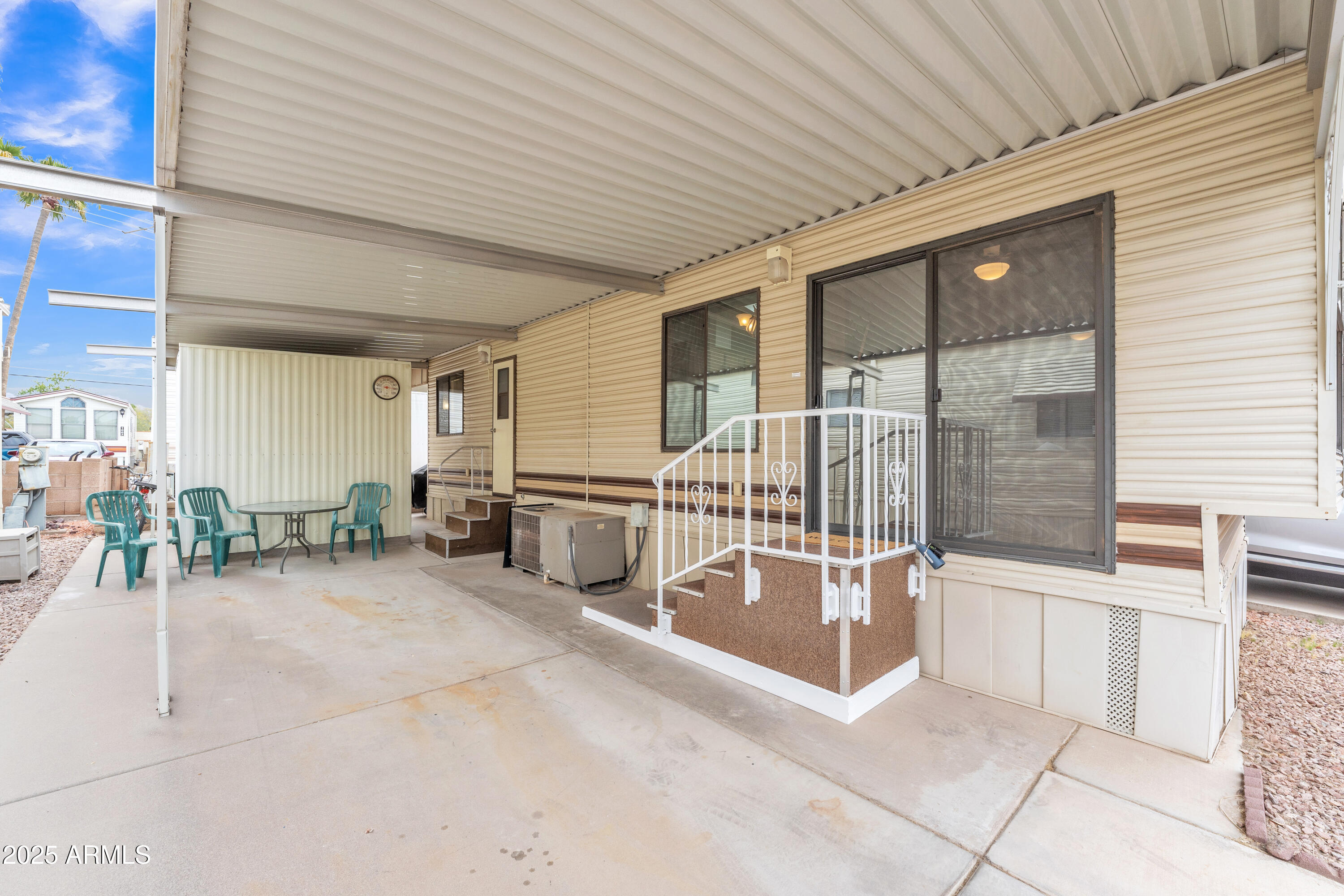 1152 South Sioux Drive Apache Junction, AZ 85119 - Photo 10 of 50 a view of a patio with table and chairs