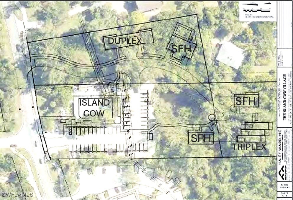 2163-2153 Periwinkle Way Sanibel, FL 33957 - Photo 6 of 37 a sign that is on the side of a building