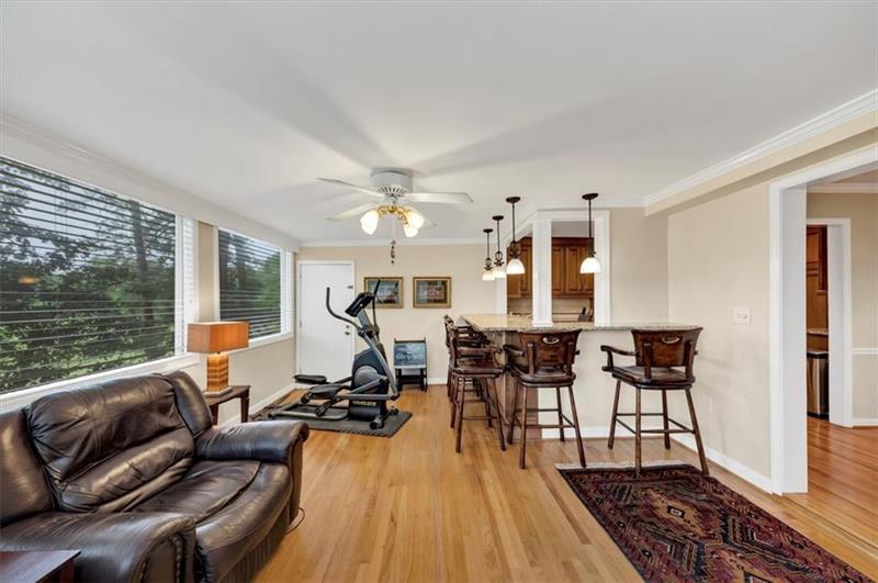 30 Chaumont Square Northwest Atlanta, GA 30327 - Photo 12 of 44 a living room with furniture and wooden floor