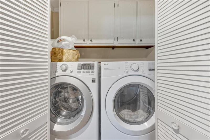 30 Chaumont Square Northwest Atlanta, GA 30327 - Photo 30 of 44 a utility room with dryer and washer