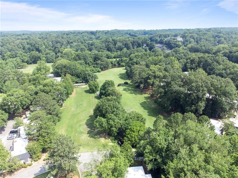 30 Chaumont Square Northwest Atlanta, GA 30327 - Photo 44 of 44 an aerial view of residential house with outdoor space and trees all around
