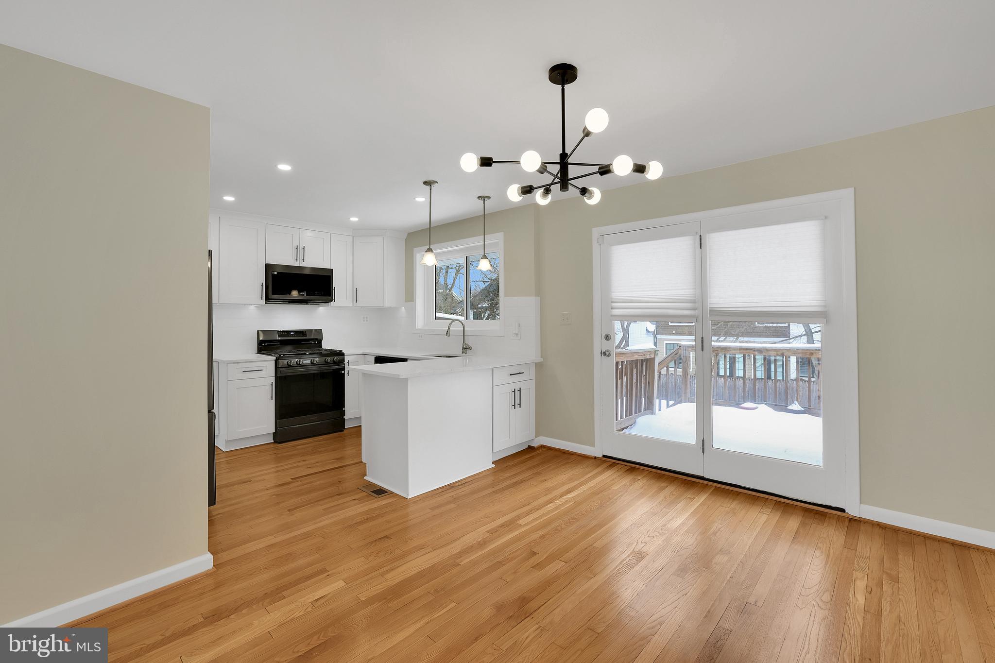 6718 Old Chesterbrook Road McLean, VA 22101 - Photo 15 of 38 a view of a kitchen with stove and cabinets