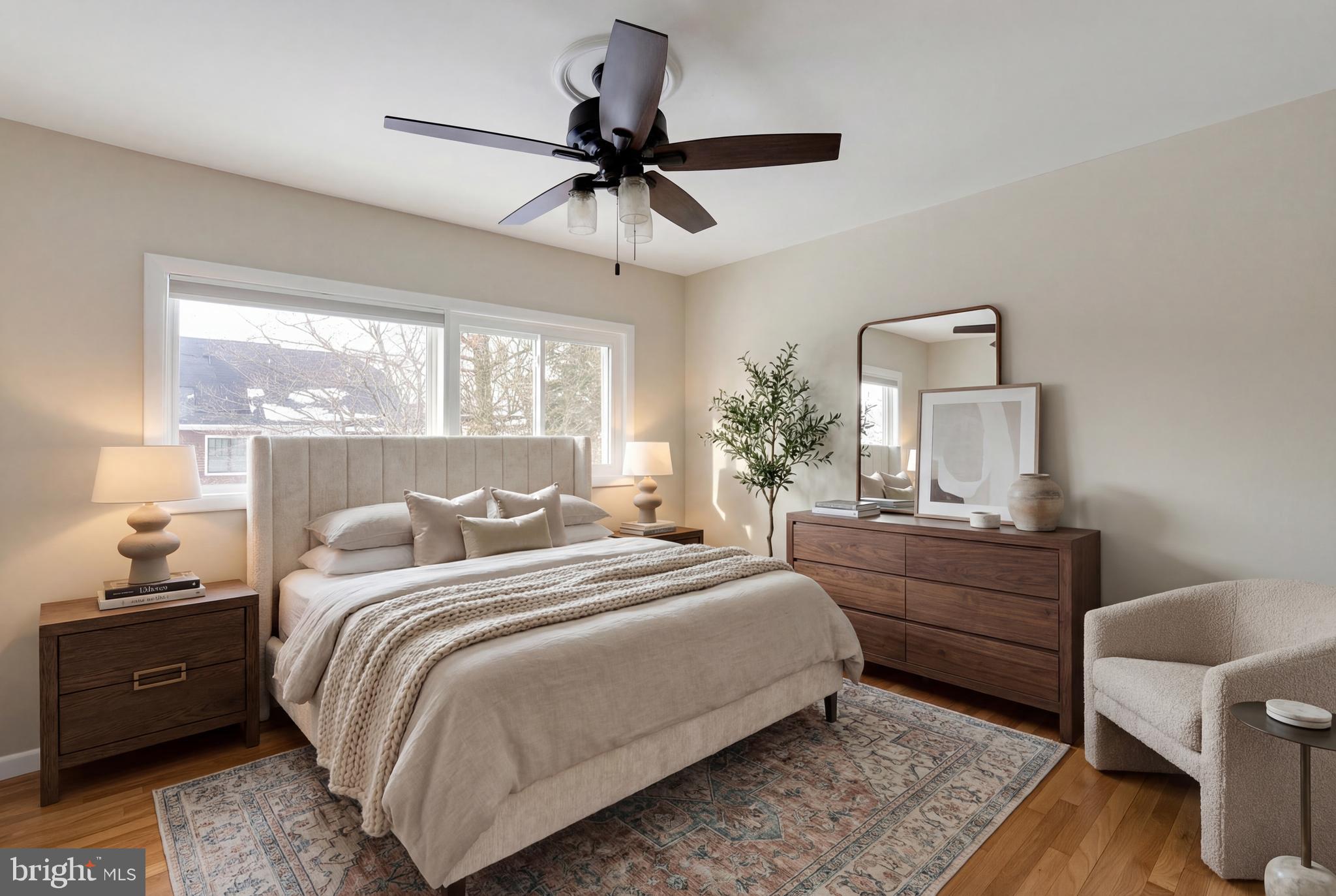 6718 Old Chesterbrook Road McLean, VA 22101 - Photo 6 of 38 a bedroom with a bed and a chandelier
