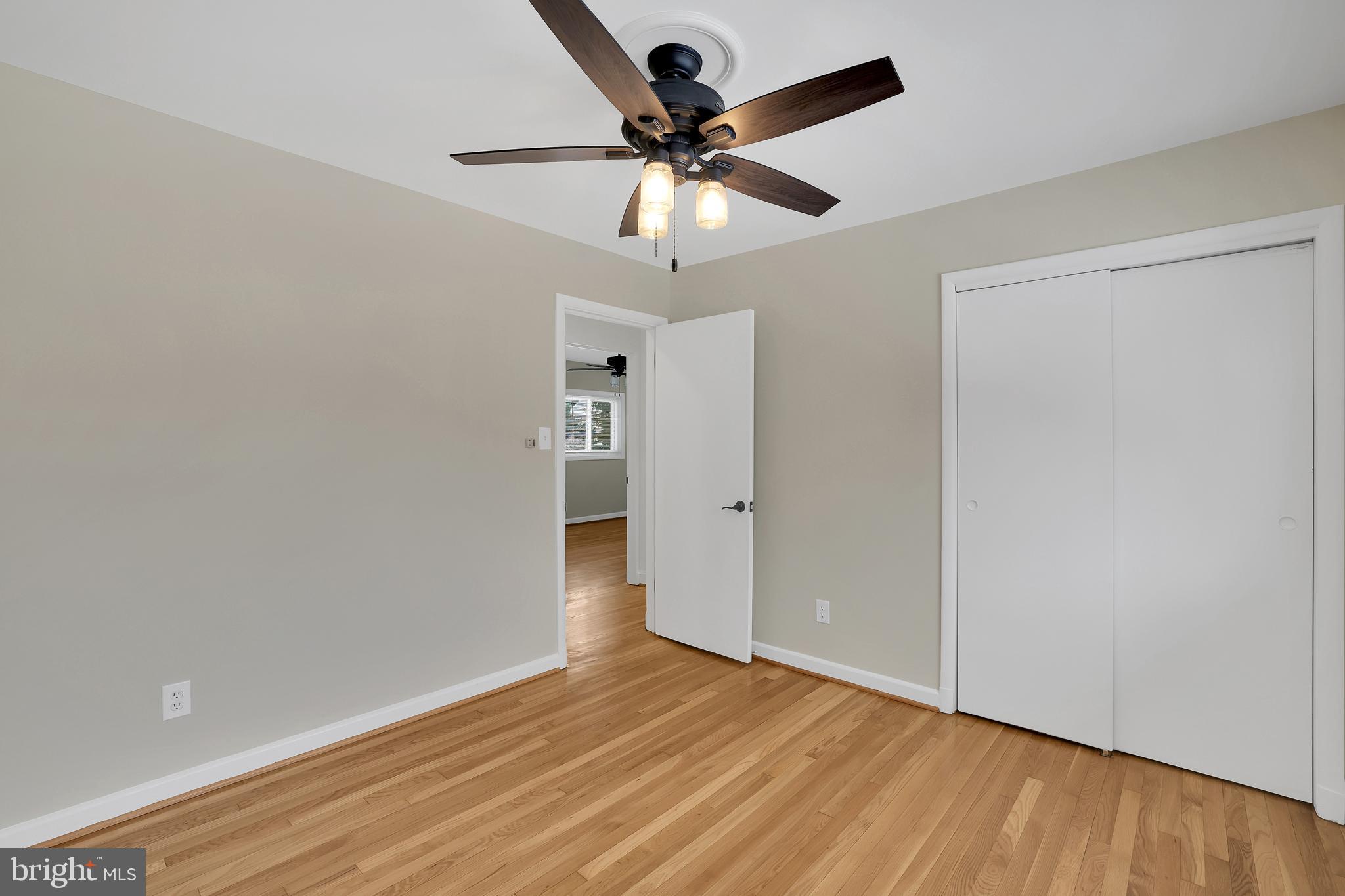 6718 Old Chesterbrook Road McLean, VA 22101 - Photo 8 of 38 wooden floor in an empty room