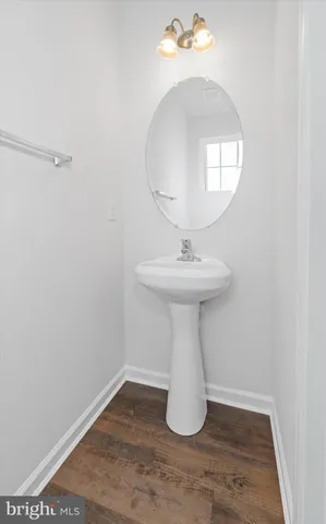 a bathroom with a toilet and a sink