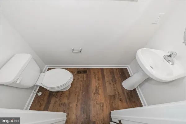 a bedroom with a bed and couch