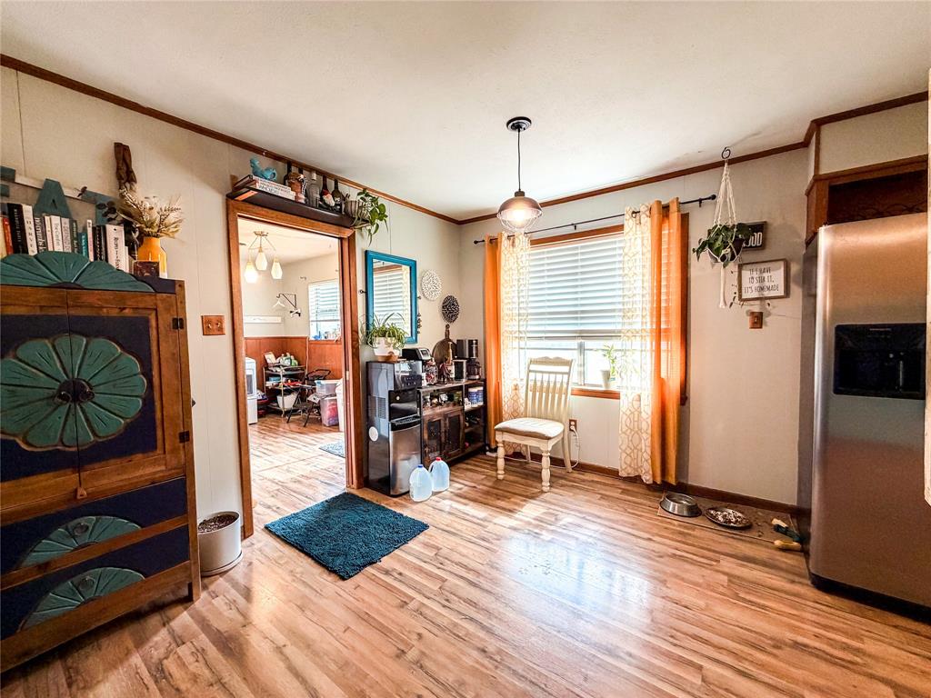 1706 North Ave H Haskell, TX 79521 - Photo 11 of 25 a bedroom with furniture and a window
