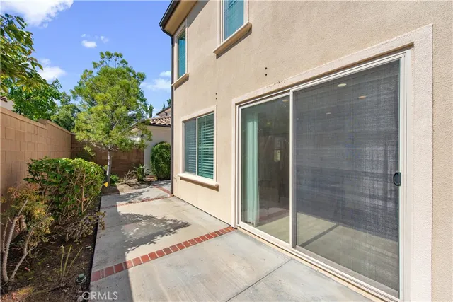 a balcony with view of outdoor space