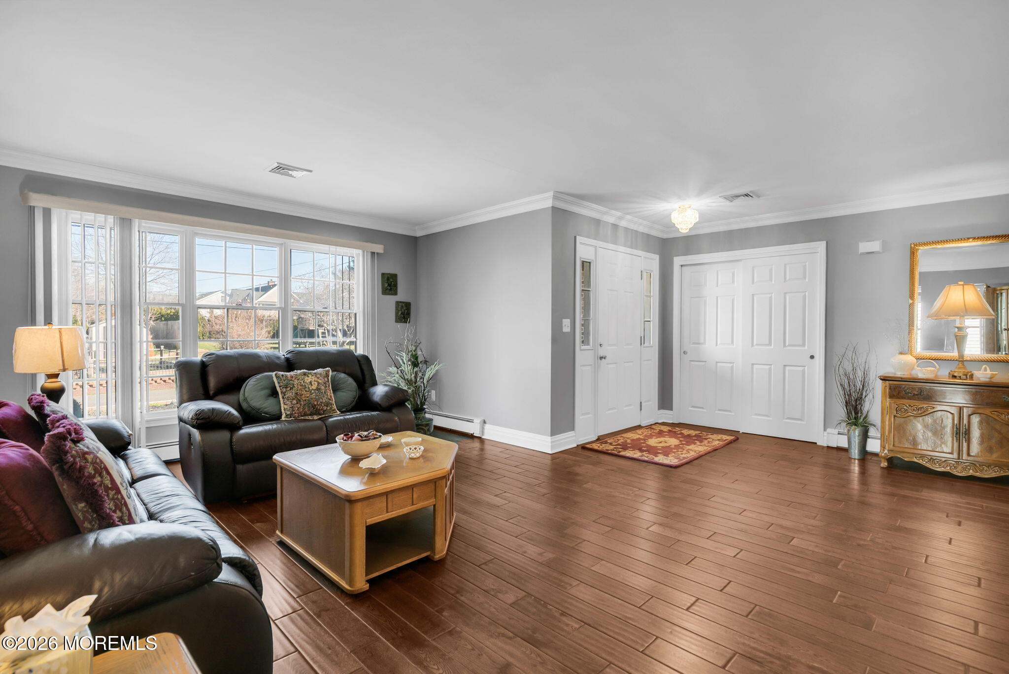 12 S Road Monmouth Beach, NJ 07750 - Photo 11 of 19 a living room with furniture and a wooden floor