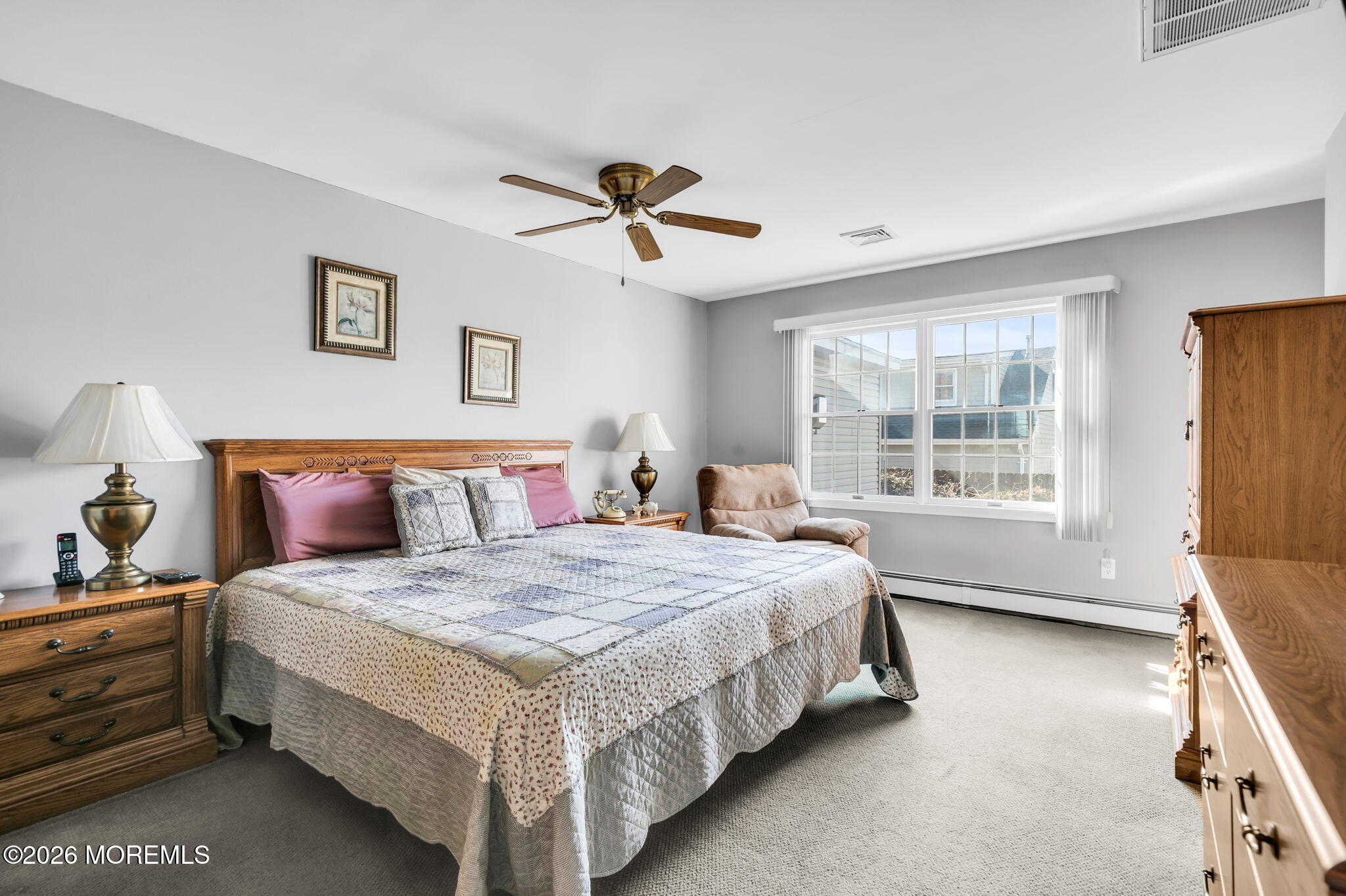 12 S Road Monmouth Beach, NJ 07750 - Photo 12 of 19 a bedroom with a bed and window