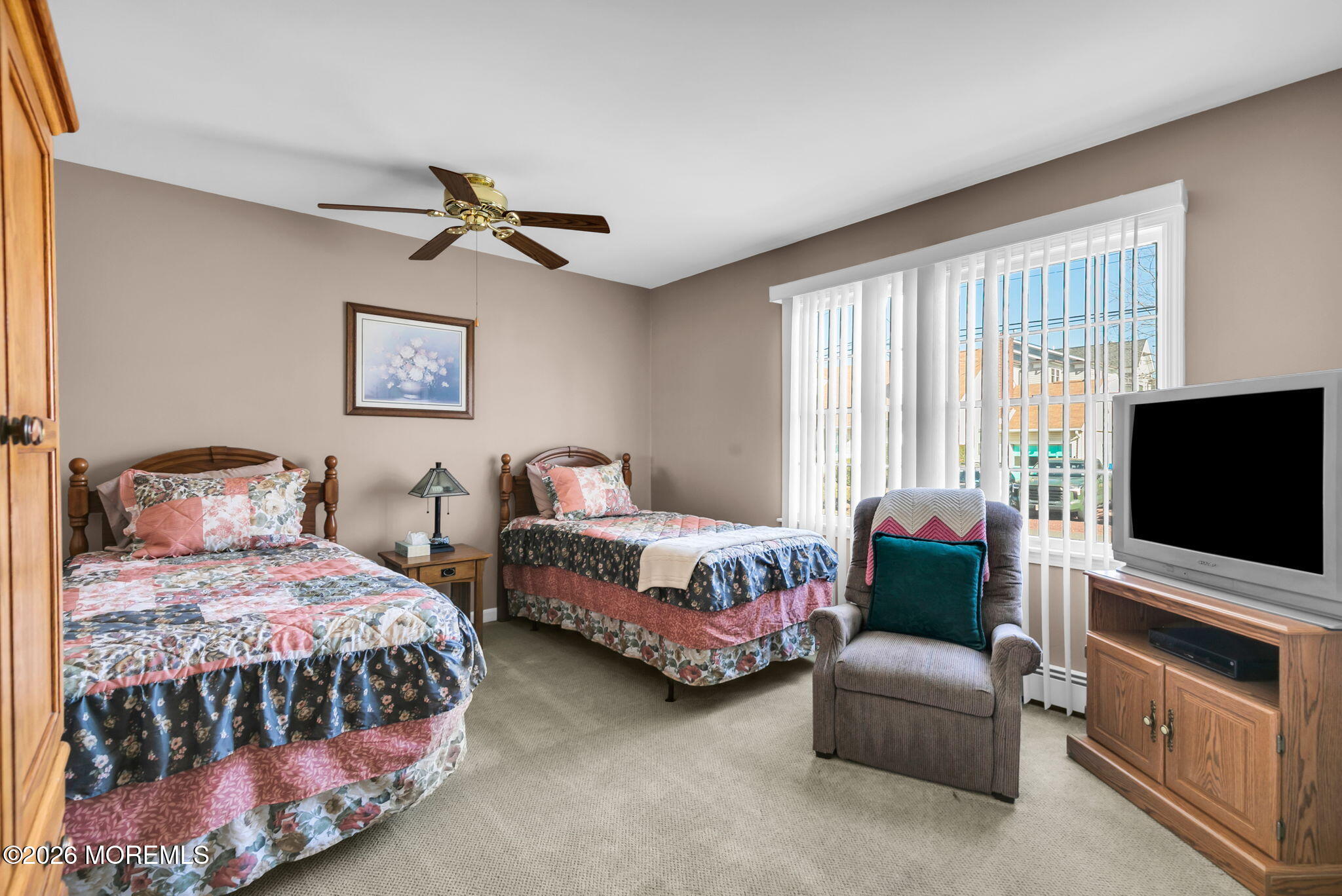 12 S Road Monmouth Beach, NJ 07750 - Photo 15 of 19 a bedroom with two beds and a flat screen tv