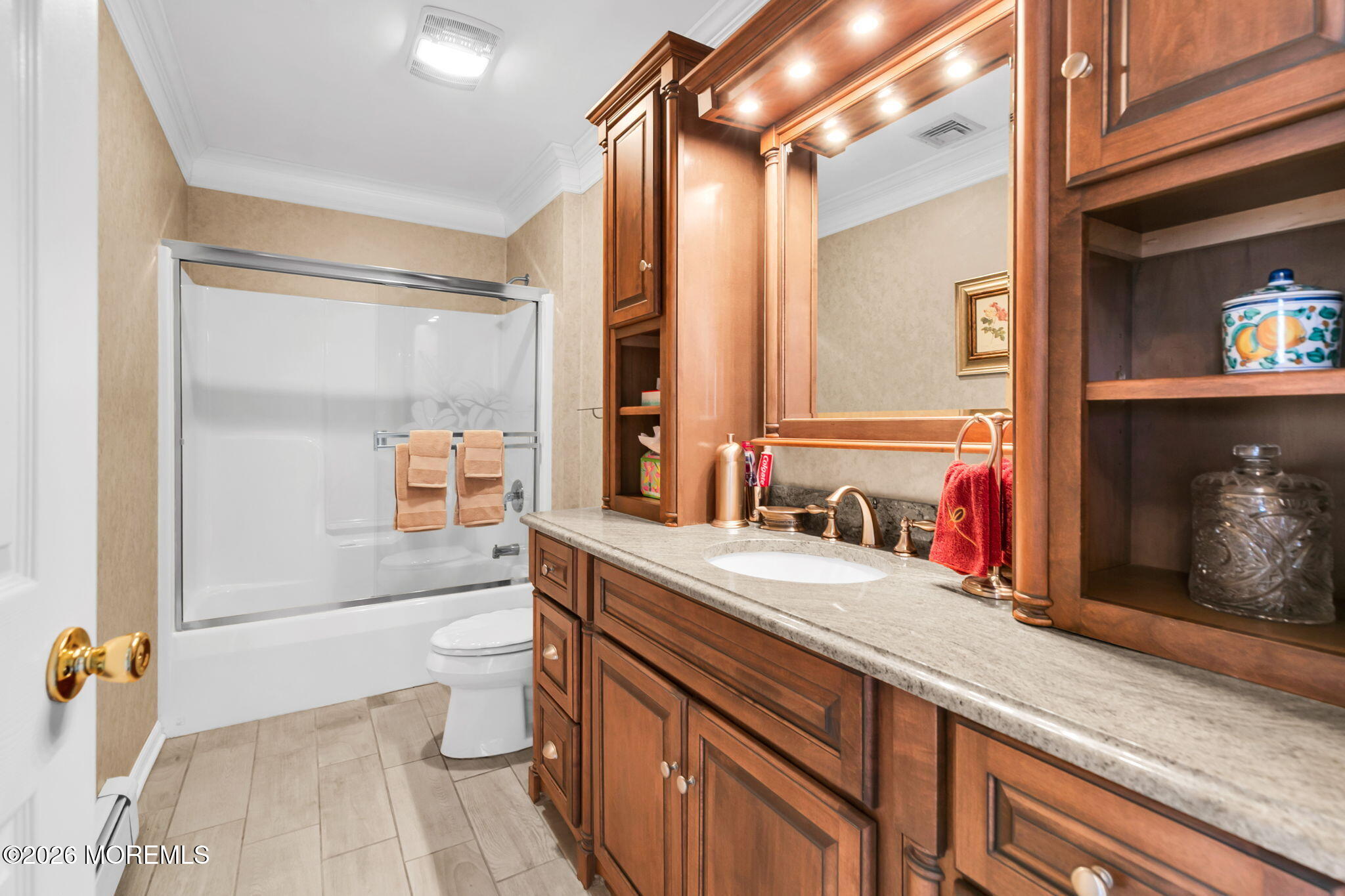 12 S Road Monmouth Beach, NJ 07750 - Photo 16 of 19 a bathroom with a granite countertop sink a toilet a mirror and shower