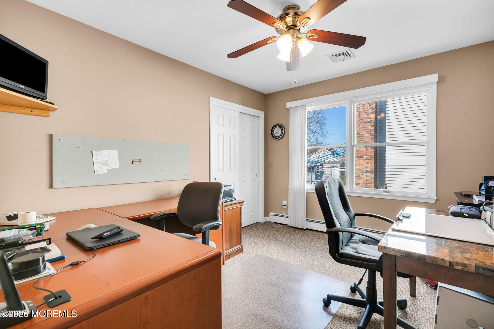 12 S Road Monmouth Beach, NJ 07750 - Photo 17 of 19 a view of a workspace with furniture and a window