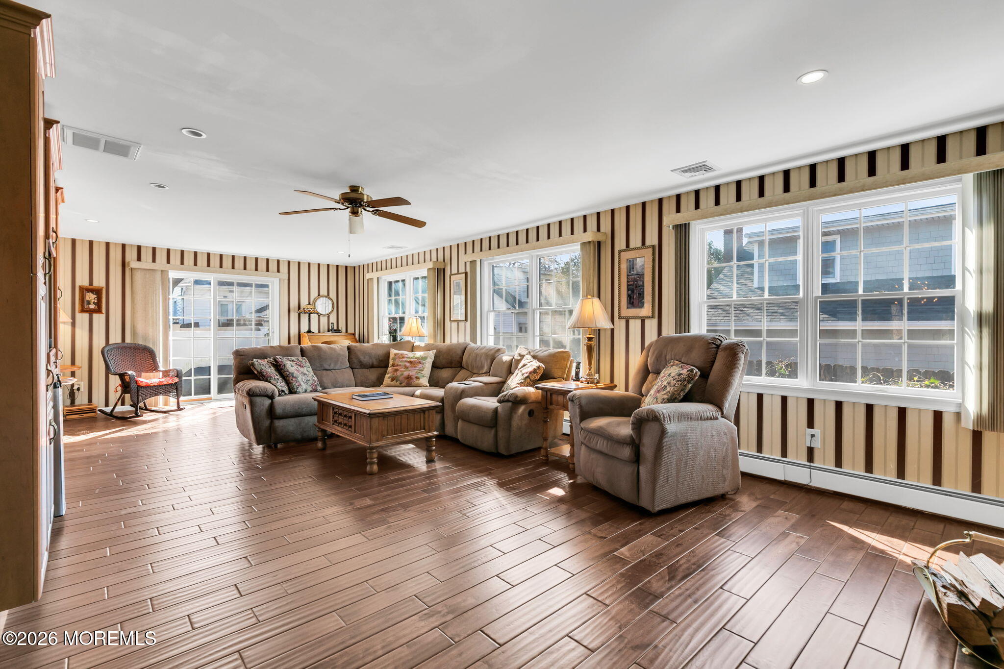 12 S Road Monmouth Beach, NJ 07750 - Photo 2 of 19 a living room with furniture and a large window