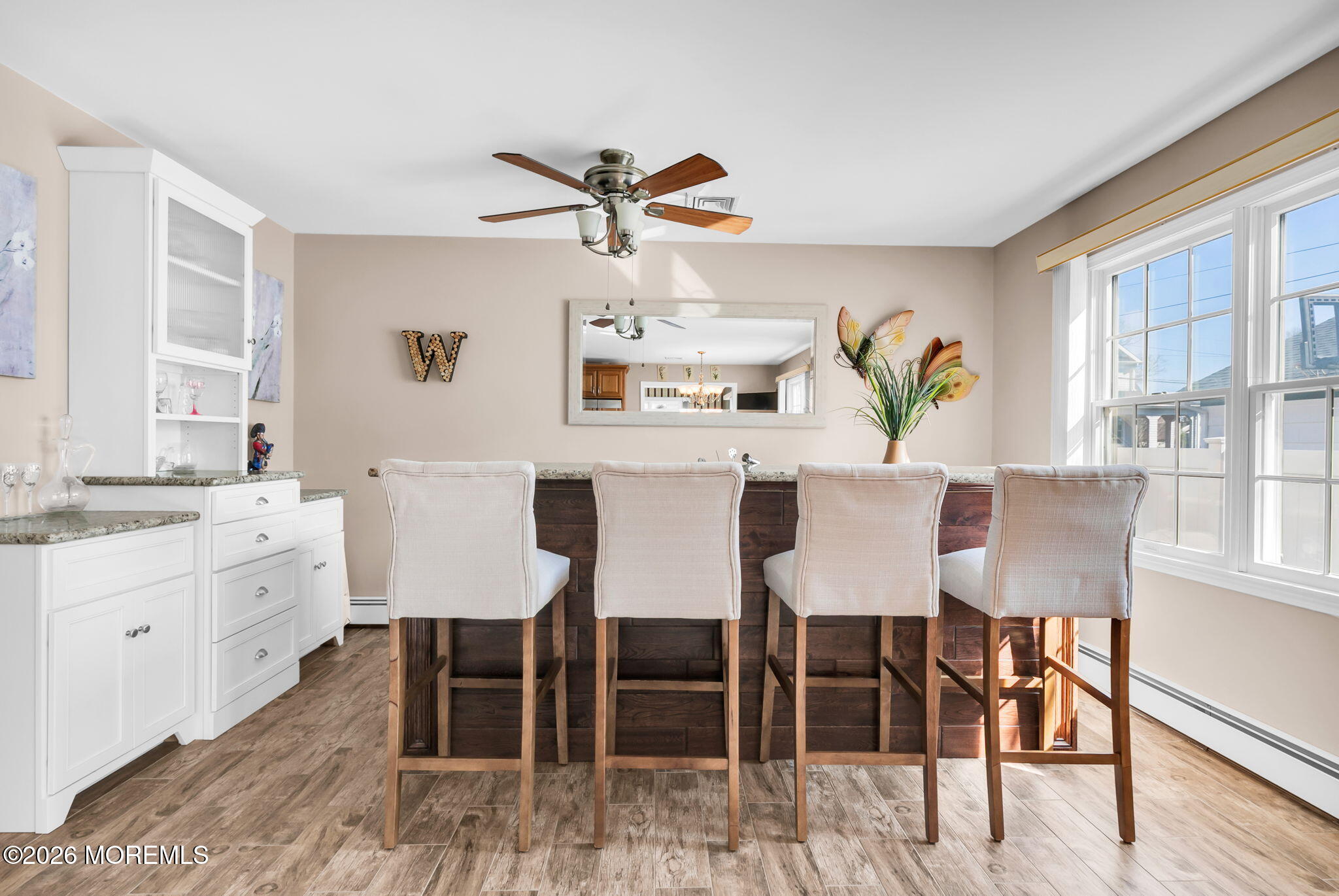 12 S Road Monmouth Beach, NJ 07750 - Photo 6 of 19 a view of a dining room with furniture window and wooden floor