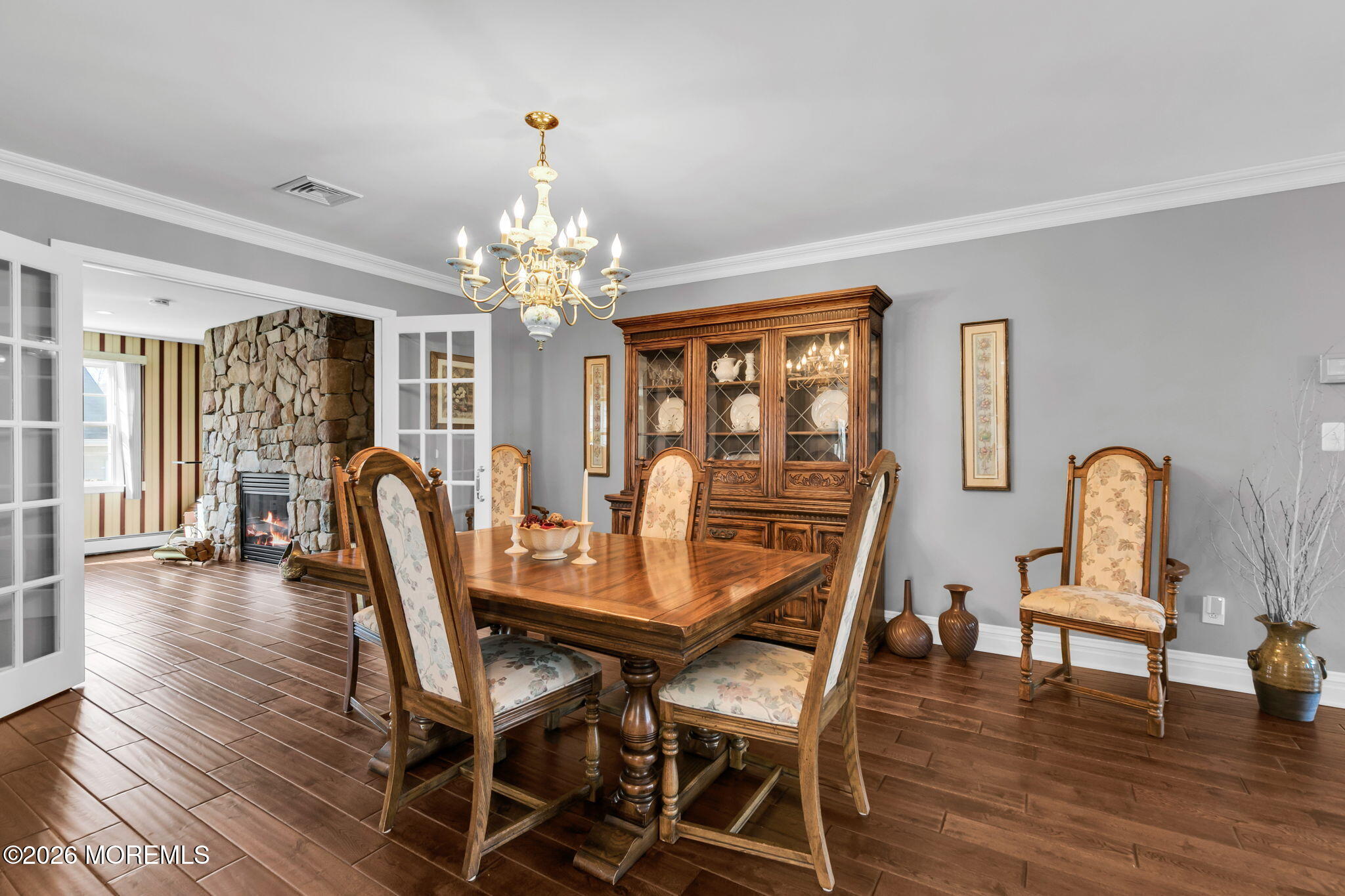 12 S Road Monmouth Beach, NJ 07750 - Photo 9 of 19 a view of a dining room with furniture and wooden floor