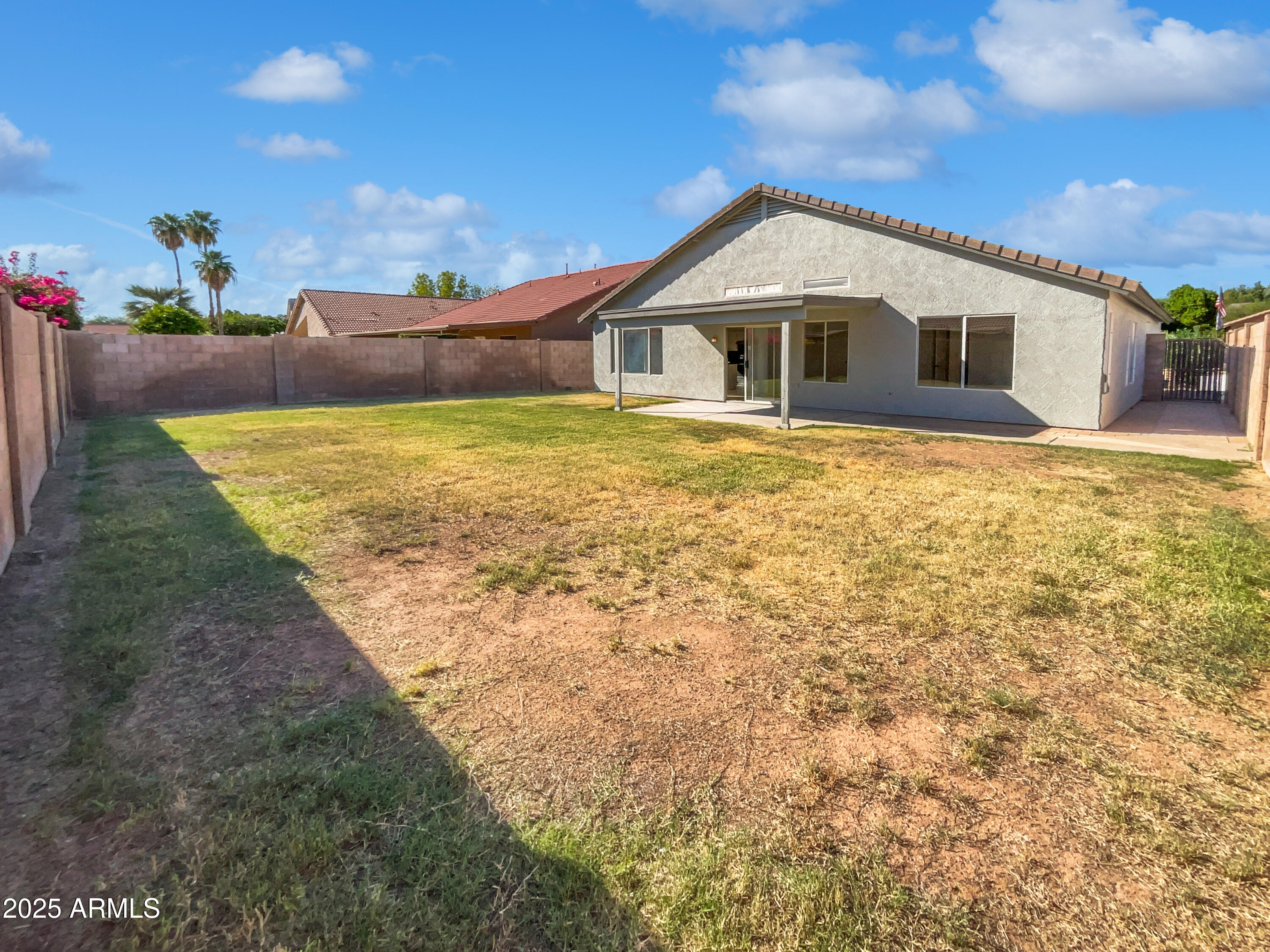 317 East Nunneley Road Gilbert, AZ 85296 - Photo 25 of 27 a front view of a house with a yard