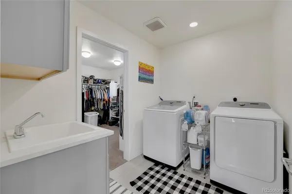a storage room with a washer and dryer