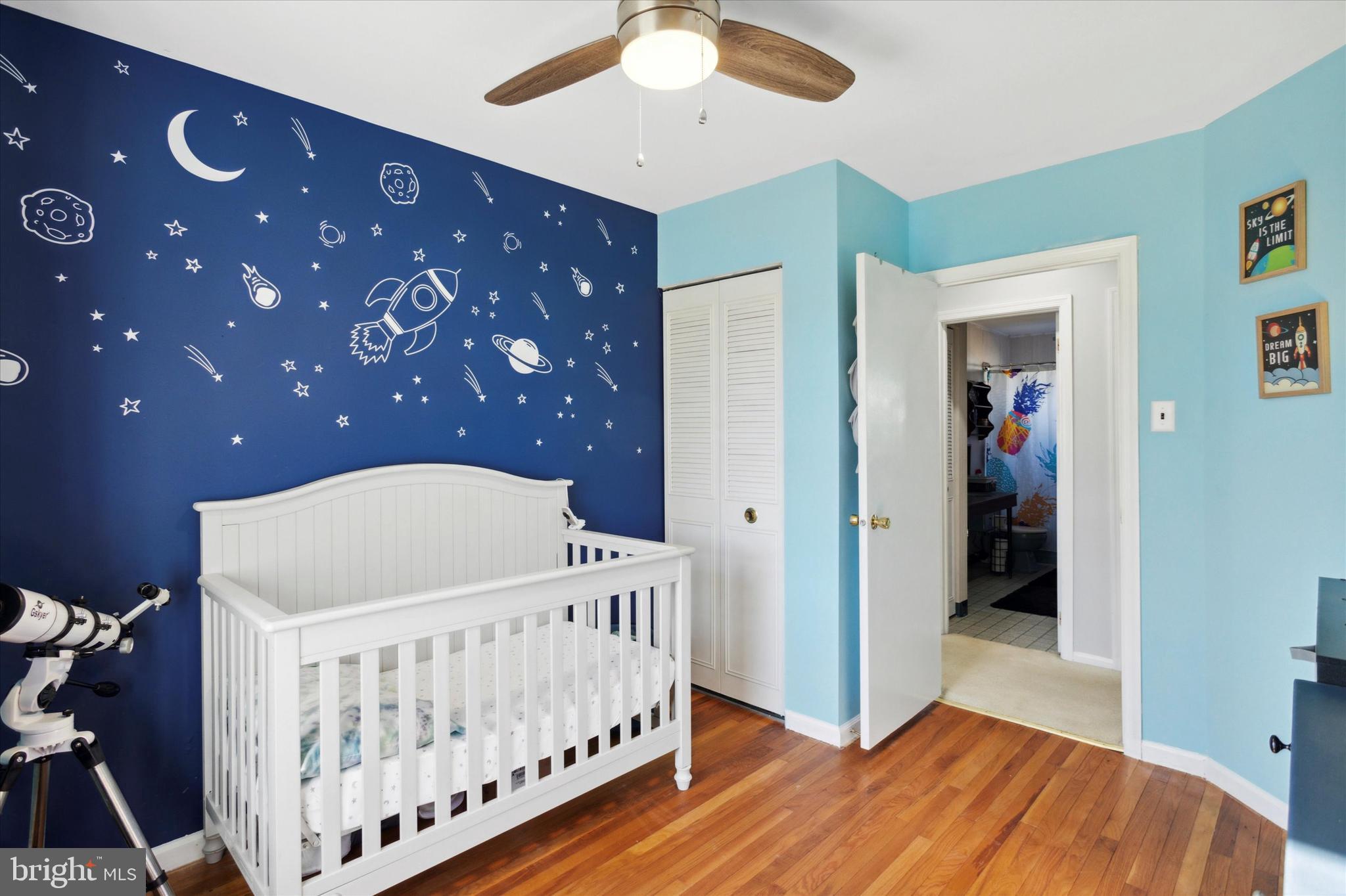 1611 Forest Drive Williamstown, NJ 08094 - Photo 15 of 31 a bedroom with a bed and a chandelier
