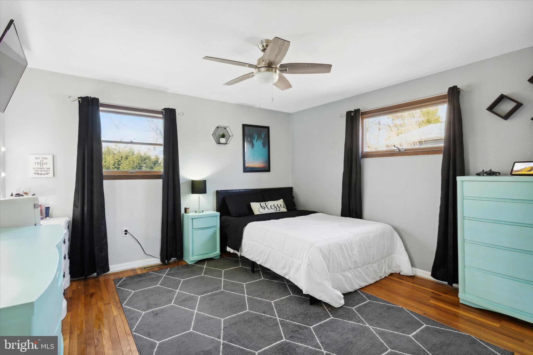 1611 Forest Drive Williamstown, NJ 08094 - Photo 20 of 31 a bedroom with a bed and a table