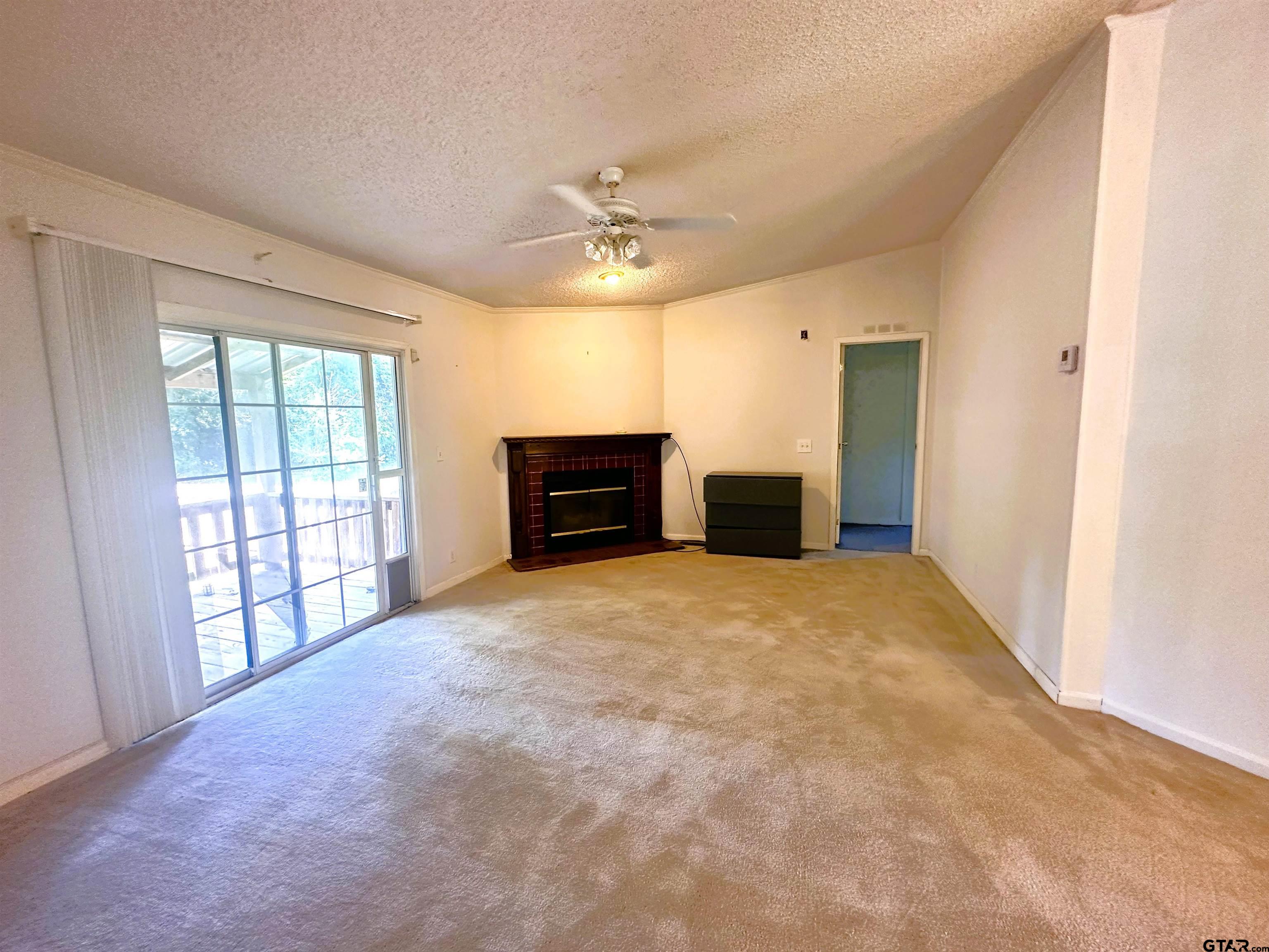 21232 Sand Jack Road Larue, TX 75770 - Photo 13 of 39 a view of an empty room with a window