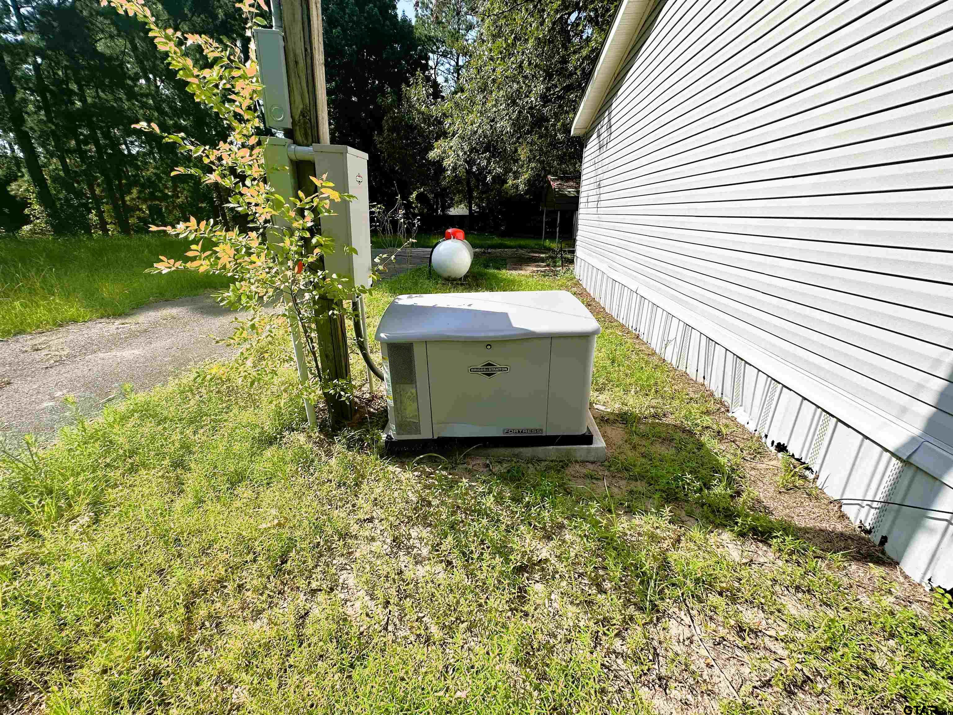 21232 Sand Jack Road Larue, TX 75770 - Photo 35 of 39 a view of a house with a yard