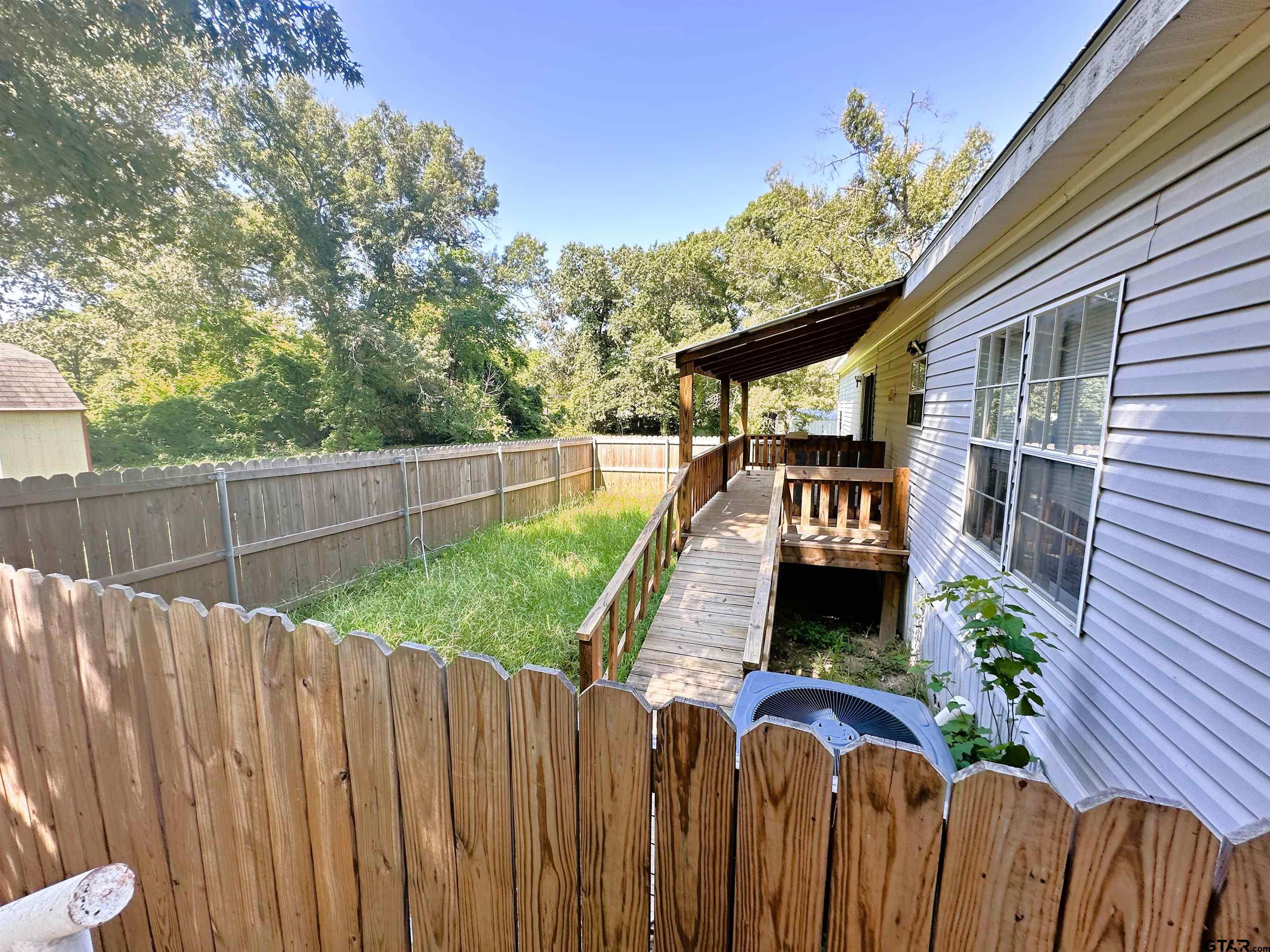 21232 Sand Jack Road Larue, TX 75770 - Photo 38 of 39 a front view of a house with a yard