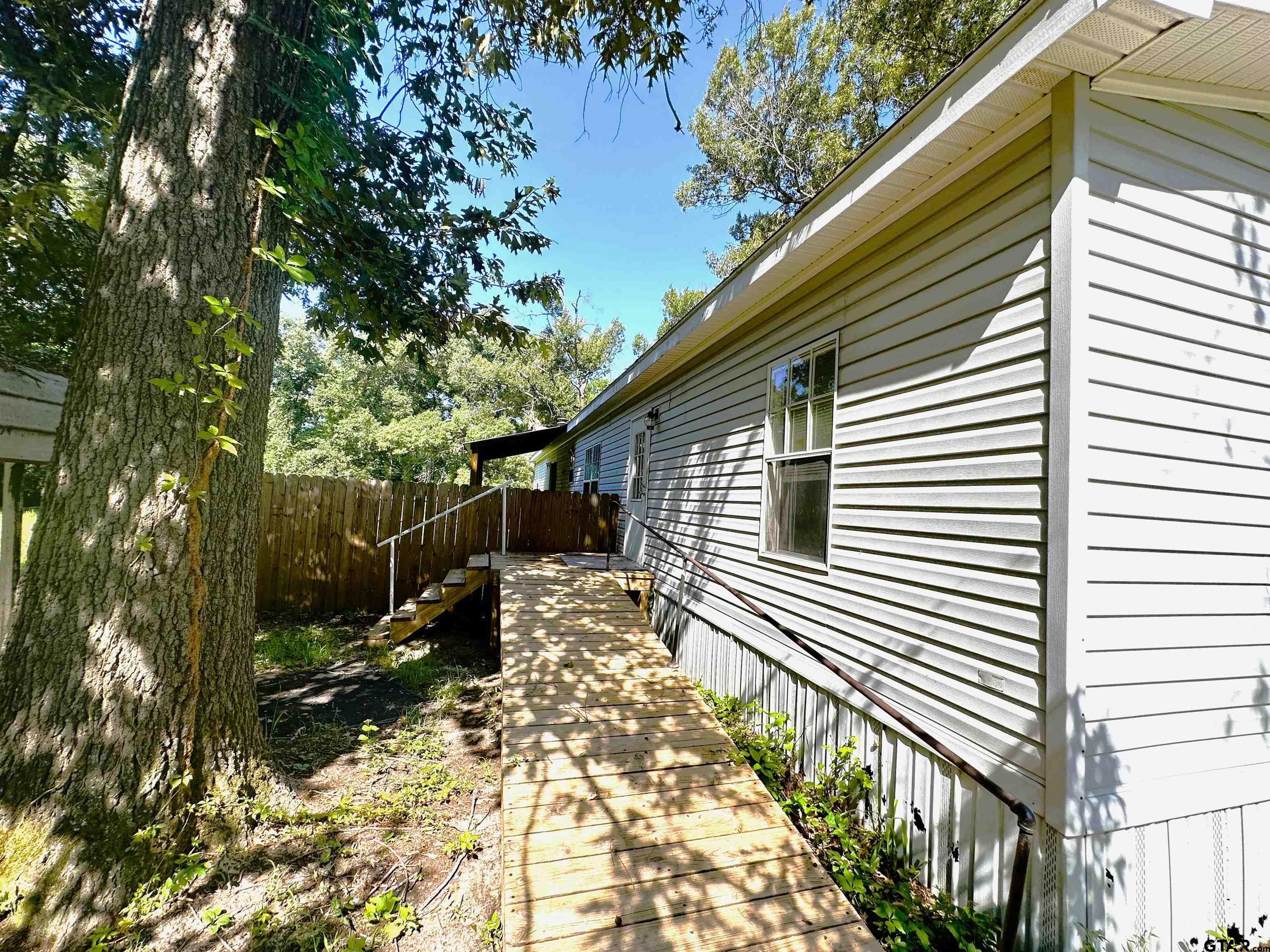 21232 Sand Jack Road Larue, TX 75770 - Photo 39 of 39 a view of a house with a patio