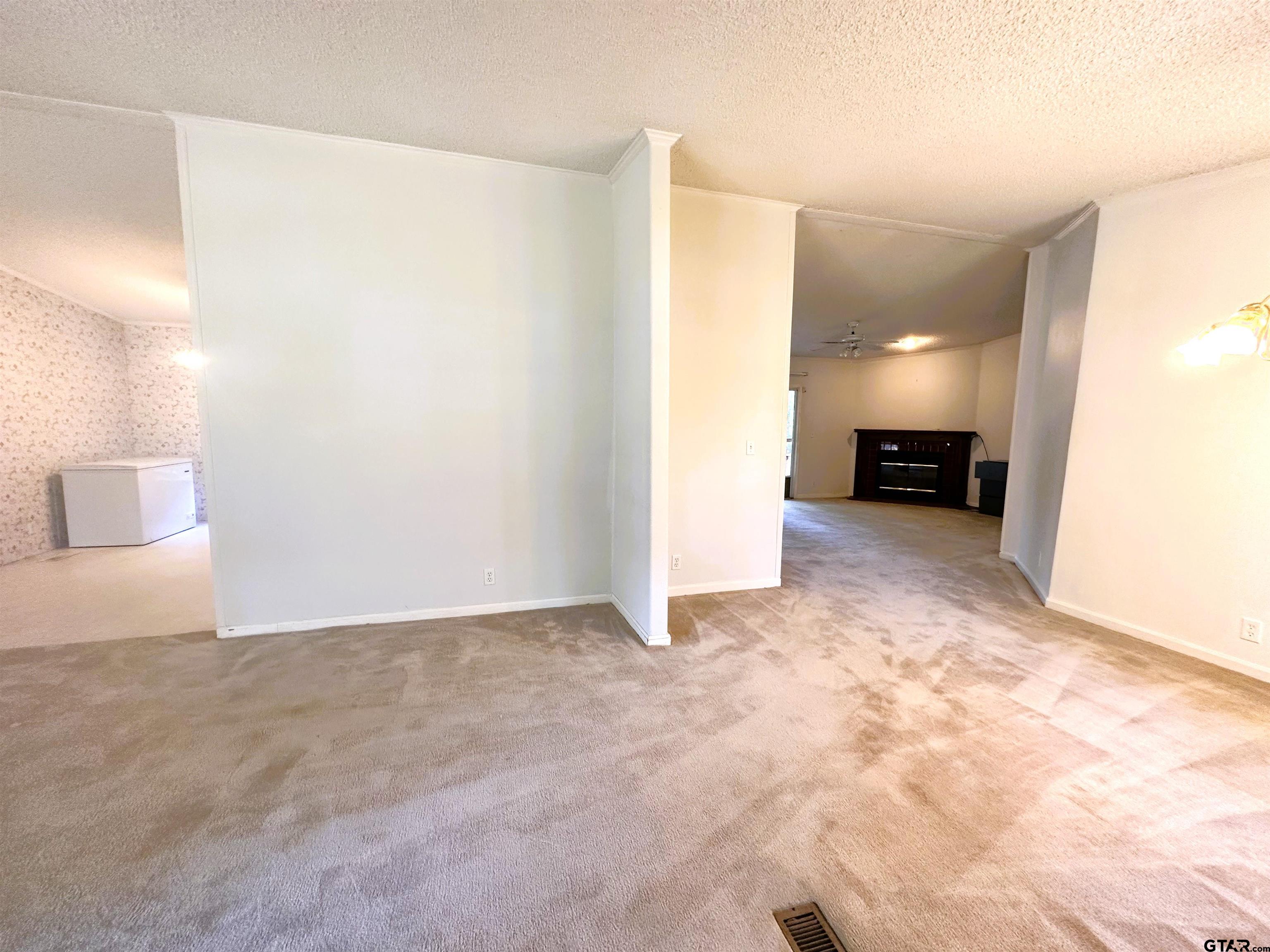 21232 Sand Jack Road Larue, TX 75770 - Photo 6 of 39 a view of a livingroom with a staircase