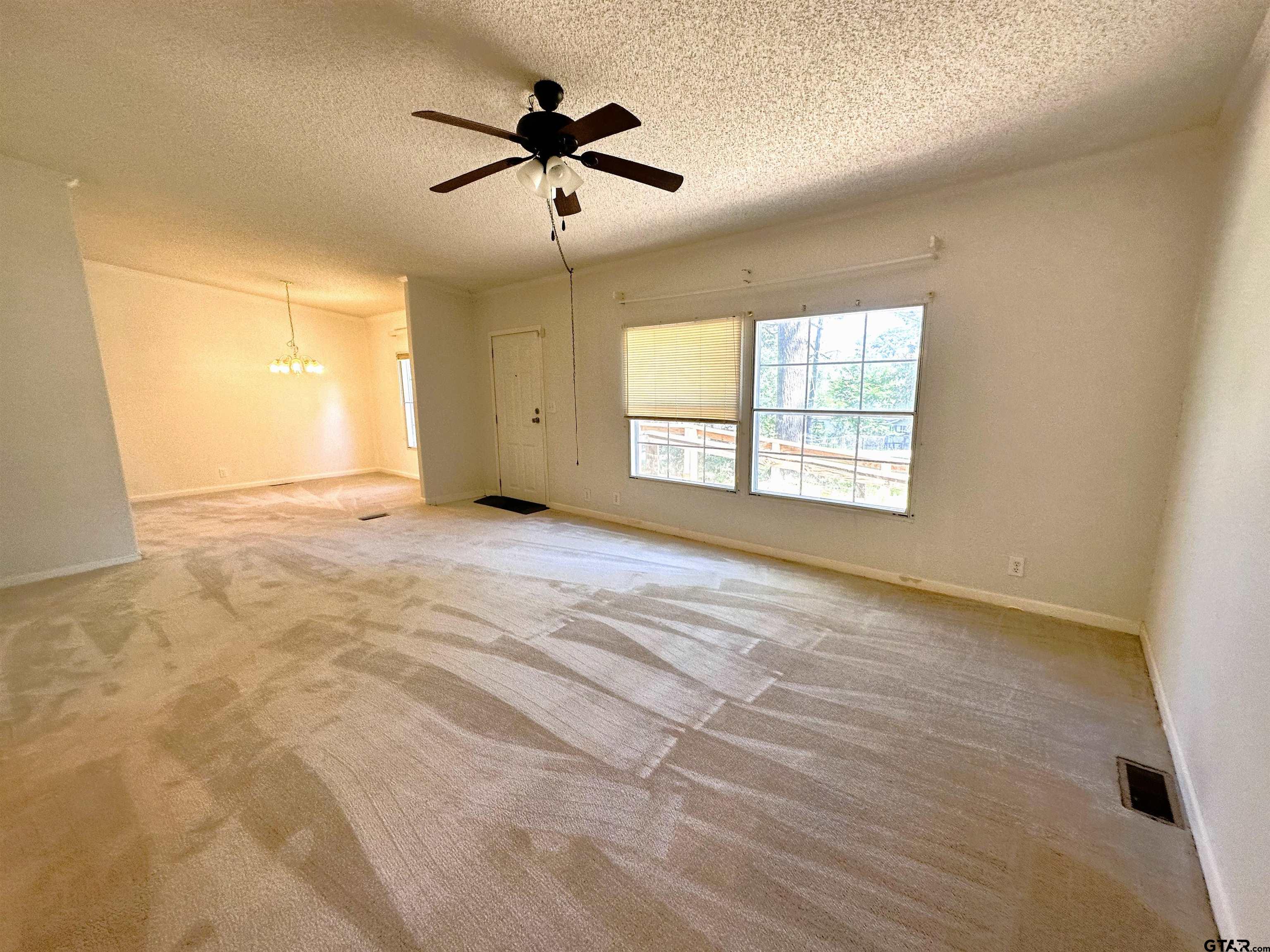 21232 Sand Jack Road Larue, TX 75770 - Photo 9 of 39 a view of an empty room with a window