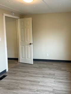 9001 South Cicero Avenue, Unit 134 Oak Lawn, IL 60453 - Photo 4 of 6 a view of wooden floor and closet in a room