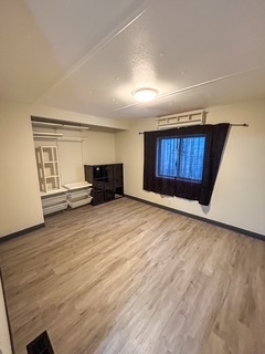 9001 South Cicero Avenue, Unit 134 Oak Lawn, IL 60453 - Photo 6 of 6 wooden floor in an empty room with a window