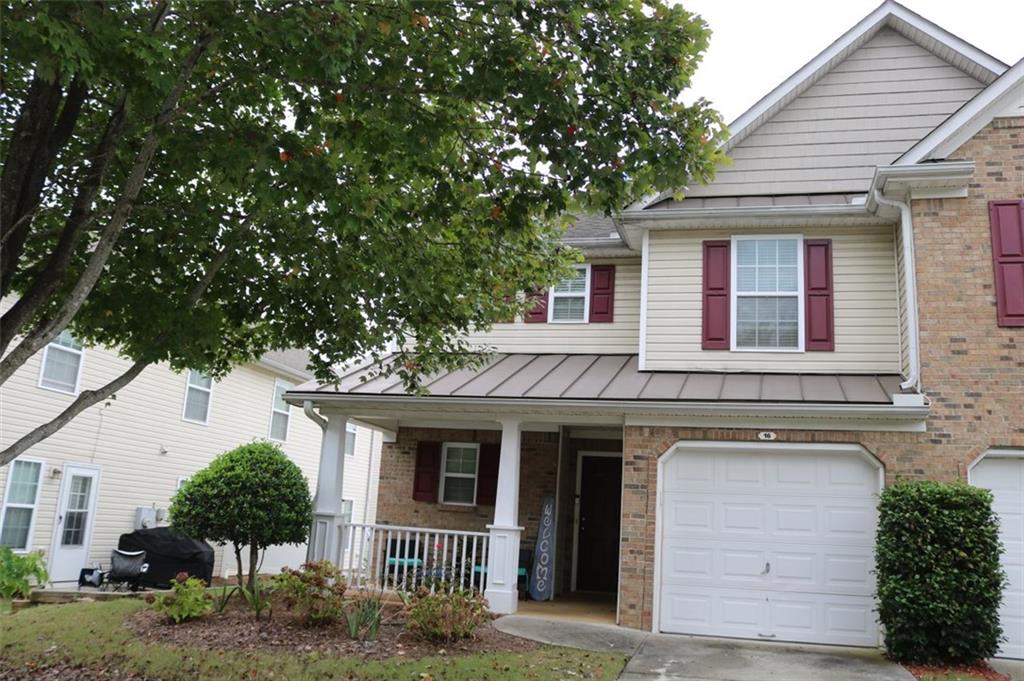16 Darby's Crossing Point Hiram, GA 30141 - Photo 1 of 1 a front view of a house with a yard and garage