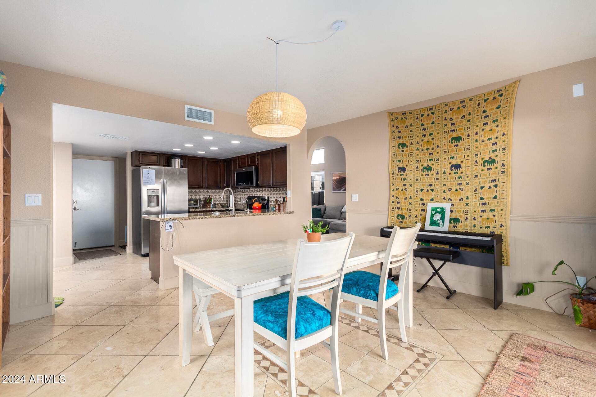 1836 North Stapley Drive, Unit 102 Mesa, AZ 85203 - Photo 12 of 34 a view of a dining room with furniture